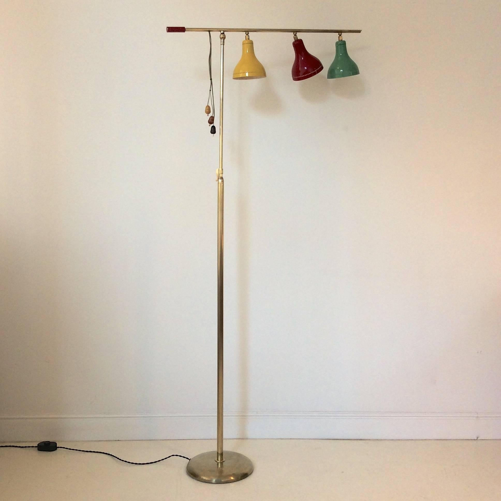 Rare and unusual adjustable floor lamp.
Brass, original yellow, red and green lacquered metal, three original bakelite light switches.
Rewired. 3 E27 40w bulbs .
Good original condition.
Dimensions: 190 cm max H, 155 cm min H, 80 cm W, 28 cm D.
We