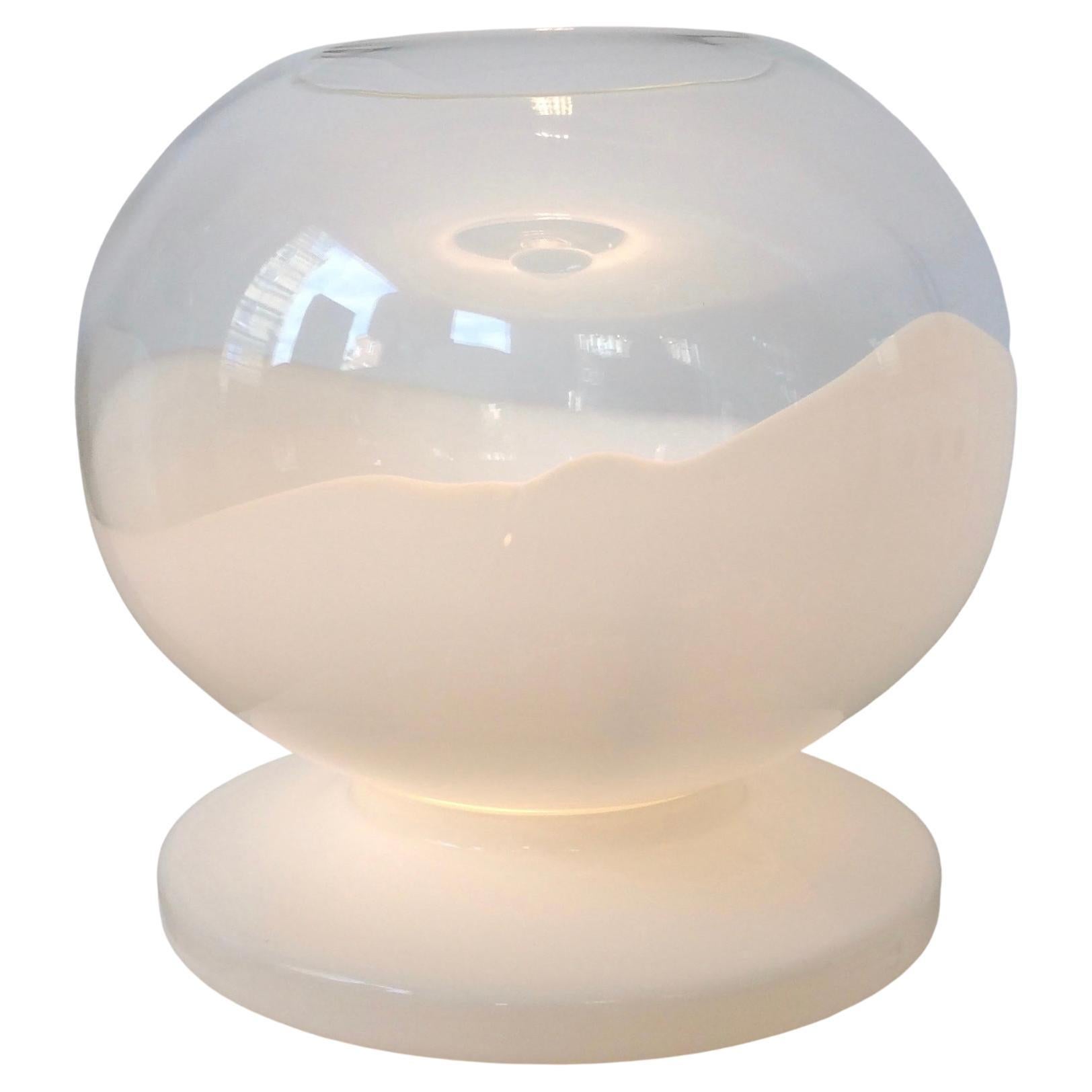Large table lamp for Mazzega,circa 1970, Italy.
White and clear Murano glass.
Rewired, for EU and USA use.
One E27 bulb 
Dimensions: 46 cm diameter, 46 cm H.
Good original condition.
All purchases are covered by our Buyer Protection Guarantee.
This