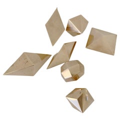 Formas geométricas decorativas de bronce dorado, hacia 1960, Francia.