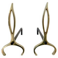 Coppia di Androni a fiamma in ottone, 1960 circa, Italia.