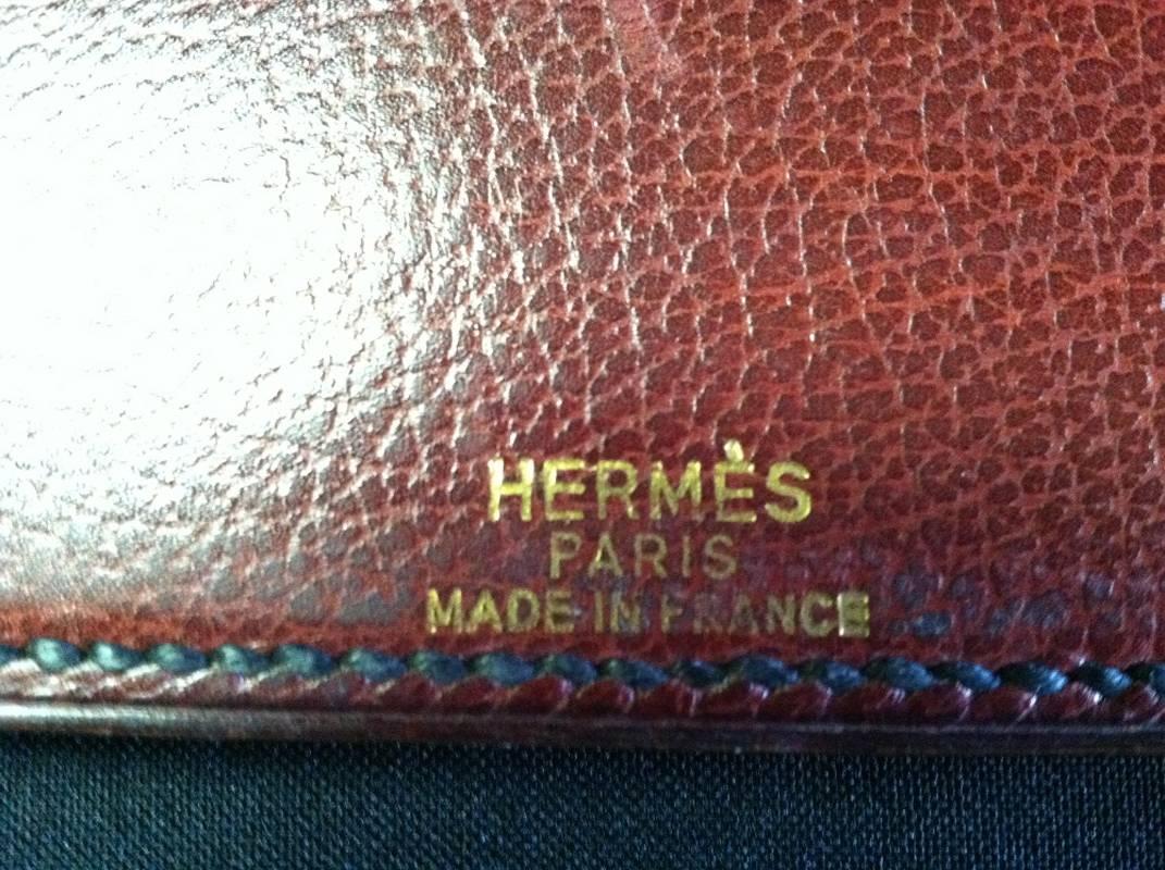 Attractive French Hermès leather desk pad with metal binding.