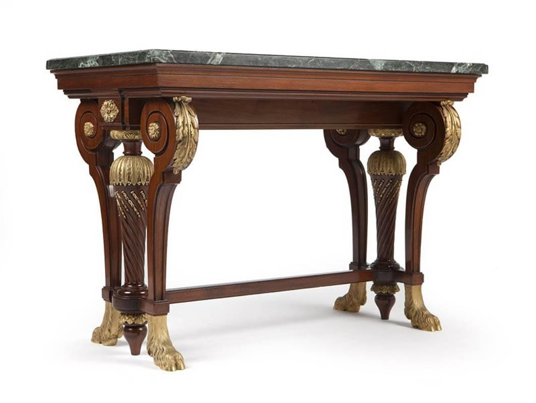 Signed Krieger extremely fine ormolu-mounted mahogany center table, the dark green marble-top over rectangular frieze on four scrolled legs and two tapered twisted columns joined with stretcher and four ormolu hairy hoof feet.

Antoine Krieger