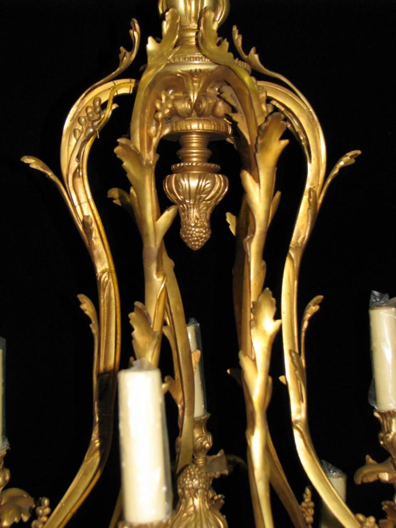 Pair of Louis XV Style Bronze Eighteen-Light Chandeliers In Good Condition In Cypress, CA