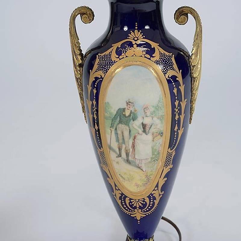 Louis XVI Pair of Sèvres Style Porcelain Urns Mounted Lamps