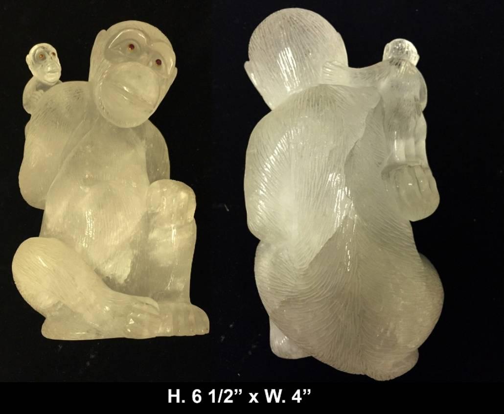 Set of three finely hand-carved and hand-polished rock crystal monkey. Intricately detailed carving also extends to the back as well as the front. The large monkey has precious gemstone eyes, possibly Ruby. 

Individual Measurements:

Large
