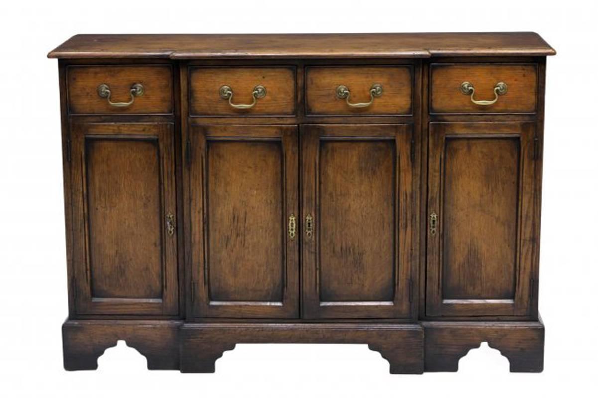 Lovely pair of late 20th century unusual Spanish oak side cabinets with four small drawers over four long doors. 

 