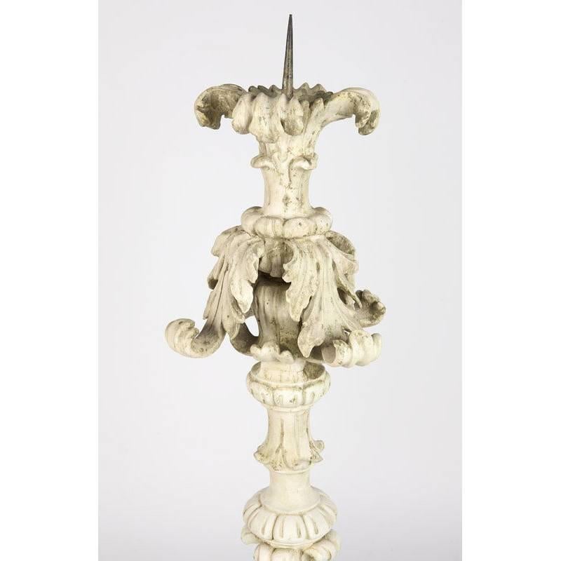 Large 19th century Italian Baroque style carved wood and hand-forged wrought iron torchieres. Wooden top finely carved with acanthus and foliage motif over wrought iron base decorated with acanthus leaves resting on four scrolled feet.
 