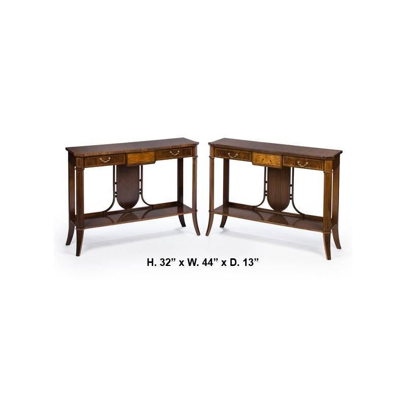 Pair of Italian Art Deco style mahogany and satinwood inlaid two-drawer console, supported by four sabre legs conjoined by platform stretcher.

 