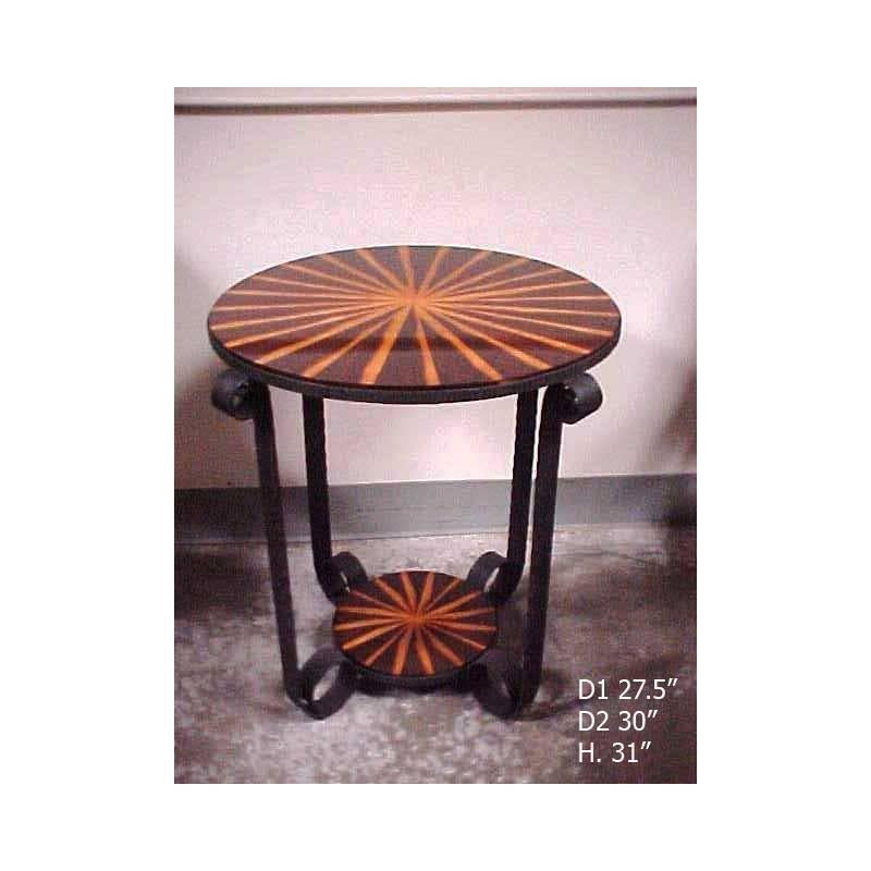 Impressive pair of Italian Art Deco hand-forged wrought iron and calamander wood round tables, 20th century.

 