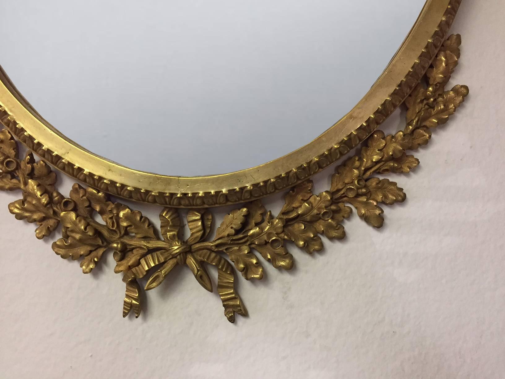 Pair of French finely chased ormolu oval mirrors with acanthus and laurel leaves. It is very rare and unique to see a pair of mirrors in all ormolu, circa 1900.

 