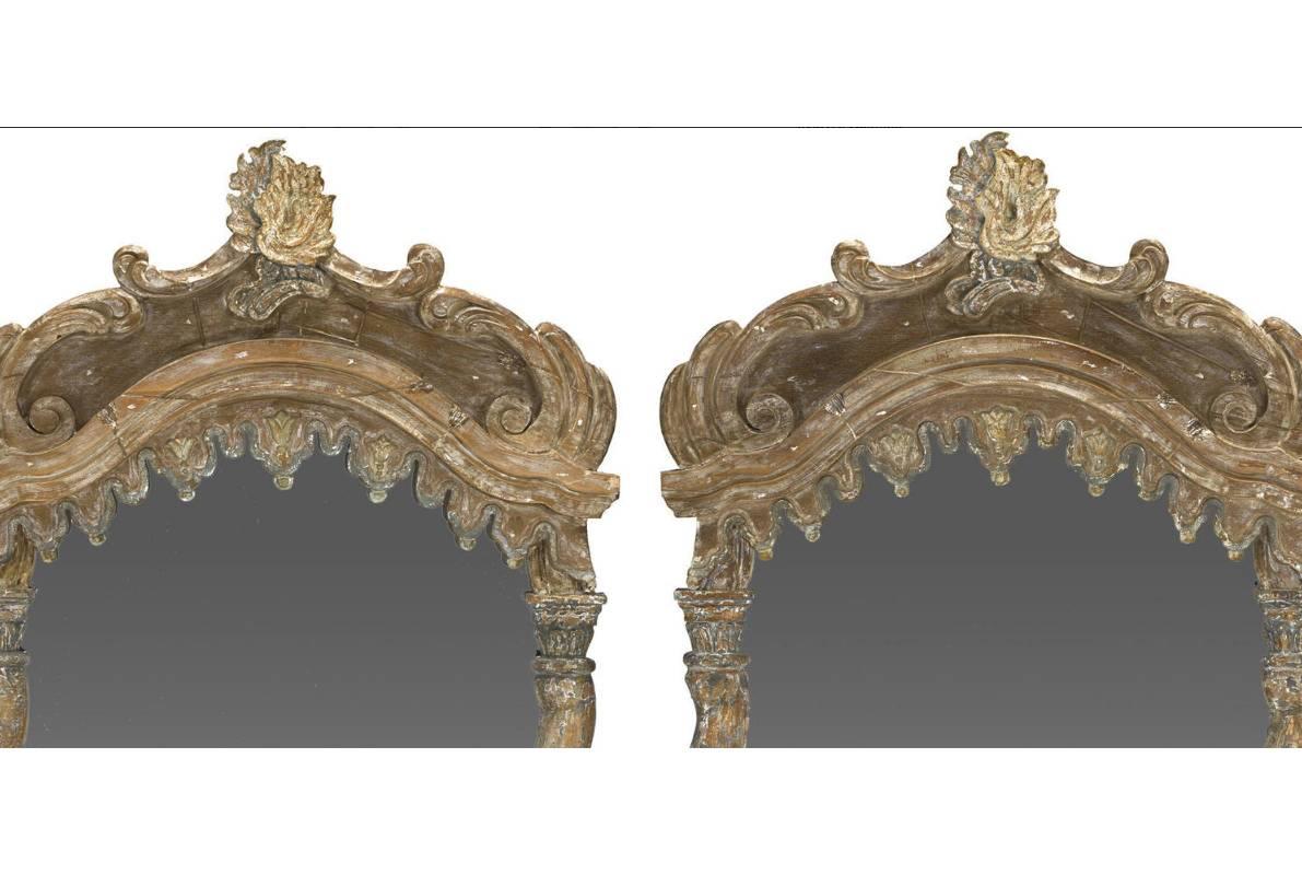 Exceptional pair of 19th century Italian Baroque style painted and carved mirrors with spiral columns.
 