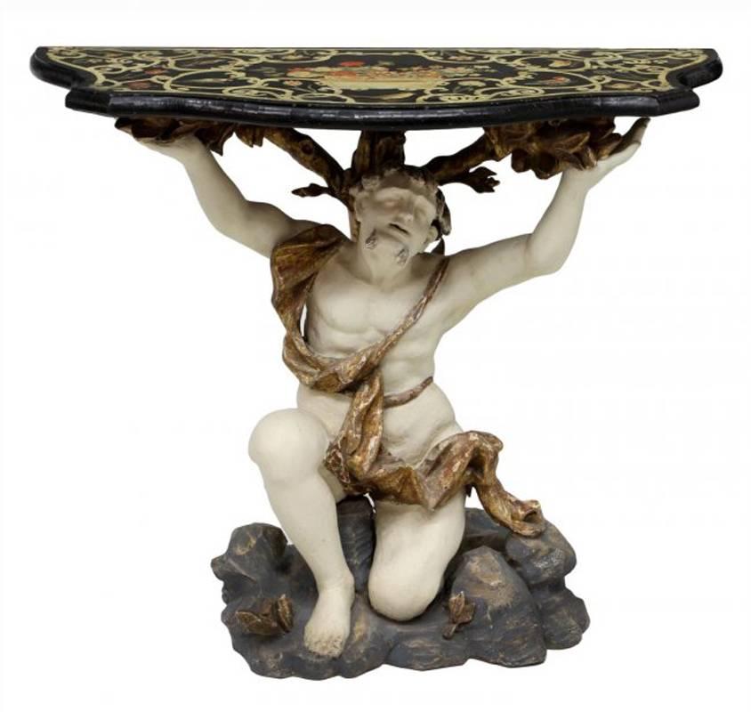 Gorgeous 18th century Italian figural console. 
The beautiful Scagliola top decorated with beautiful floral bouquet surrounded by scrolls and birds, supported by parcel-gilt and paint decorated carved kneeling figure on rocky base.
 