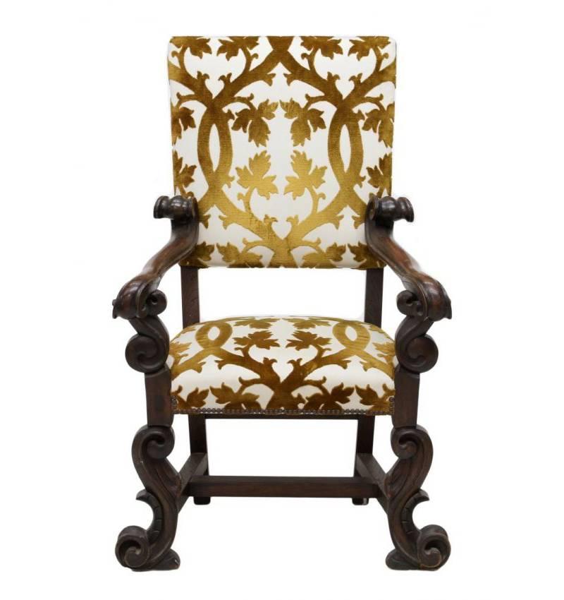Attractive 19th century Italian Baroque style carved walnut armchair with beautifully scrolled arms and legs. Upholstered with white and gold fabric. 

Measures: Arm height is 28 inches.