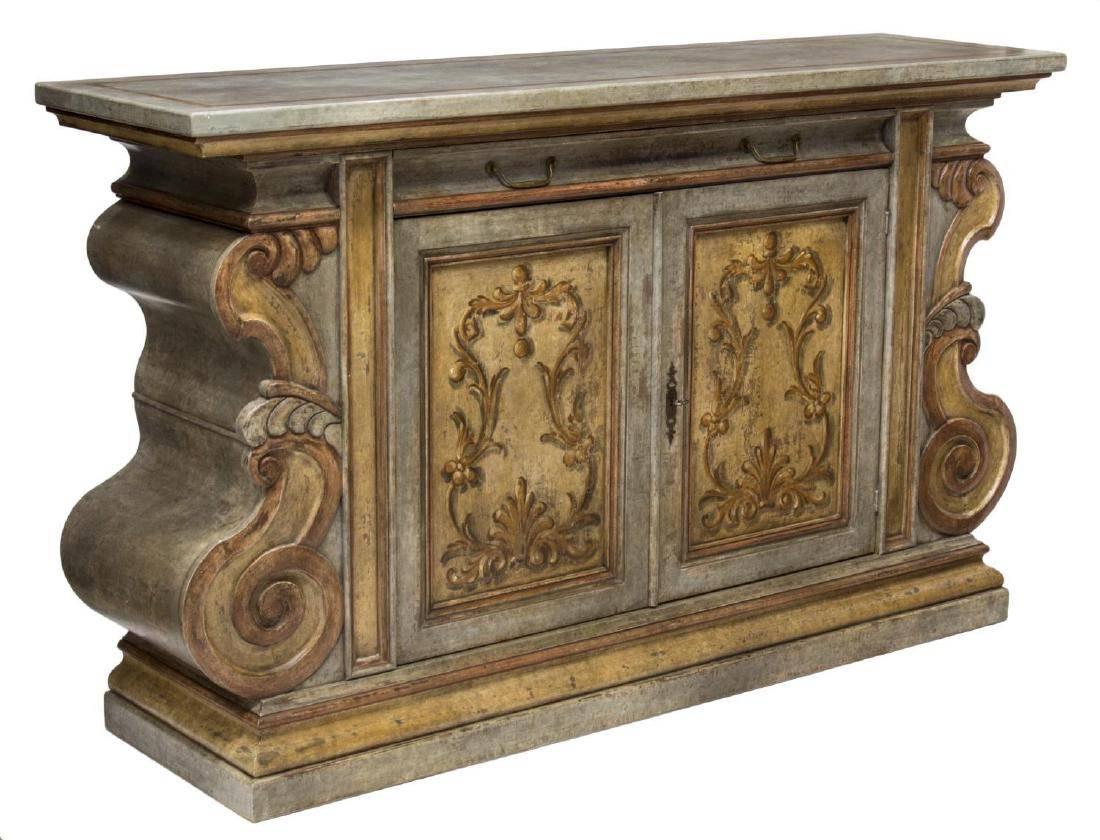 Fabulous large Italian Baroque style painted sideboard credenza.
The curved outlined shape is very striking and rare in Italian furniture; it is entirely hand-painted.
The rectangular painted wooden top over one long drawer with two doors flanked by