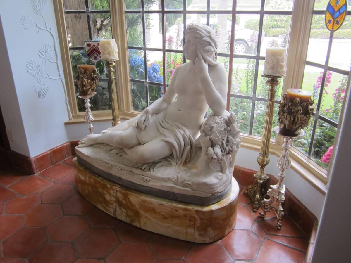 Exceptional 19th century Italian carved white marble reclining Life Size nude woman on a grey and yellow Sienna marble bases. Signed Rinaldo Rinaldi. F. first half of the 19th century
Meticulous attention has been given to every details especially