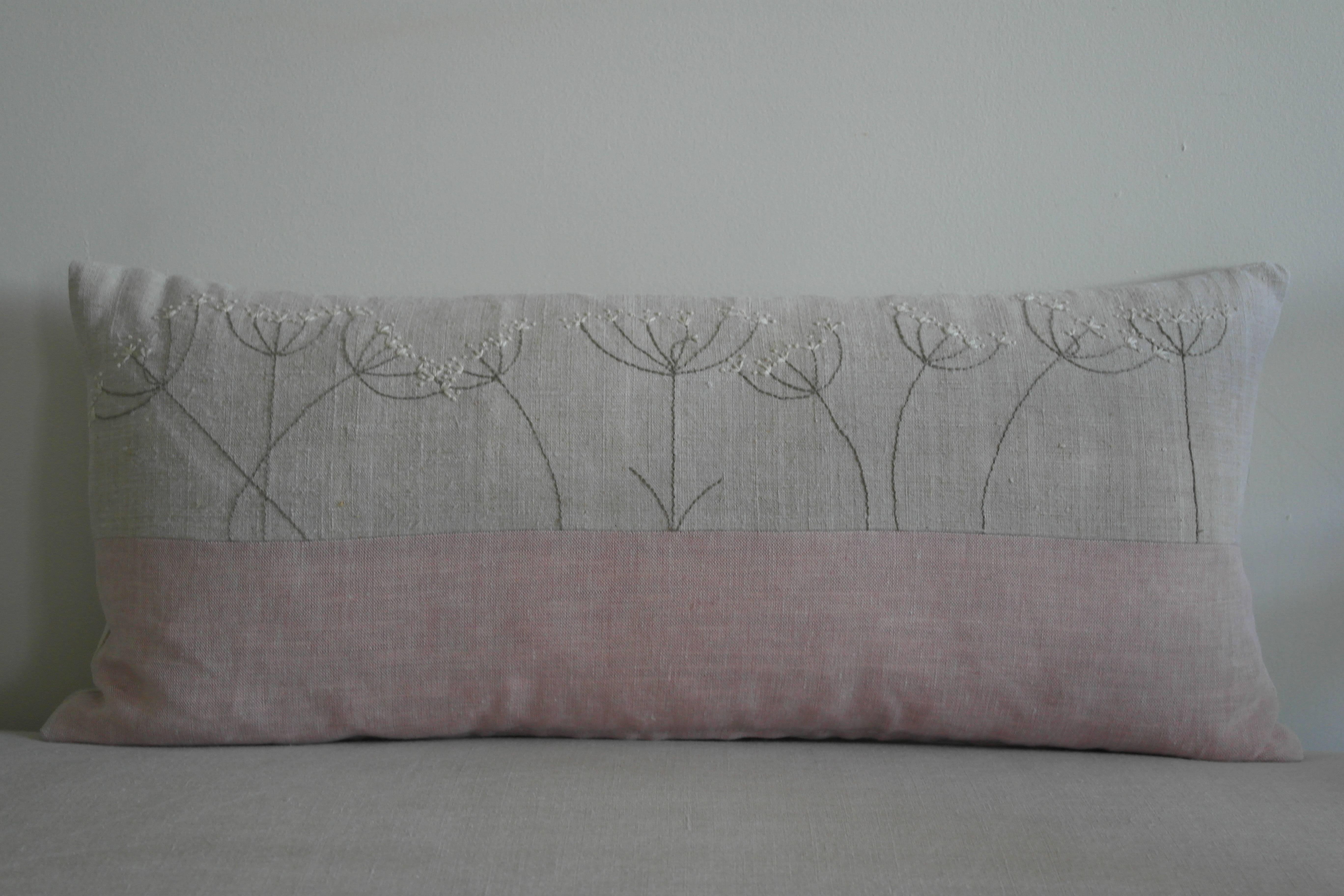 Hand embroidered cow parsley on antique French linen joined with a panel of dusty pink linen, plain linen back - zipped at bottom for laundering - includes custom-made feather pad.