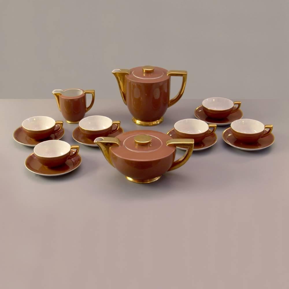 Nine-piece porcelain Tea/Coffee service with gold plate and chocolate brown glaze. Art Deco -
 Streamline Design by C&E Carstens porcelain manufacture, Gräfenroda, Germany, circa 1930.