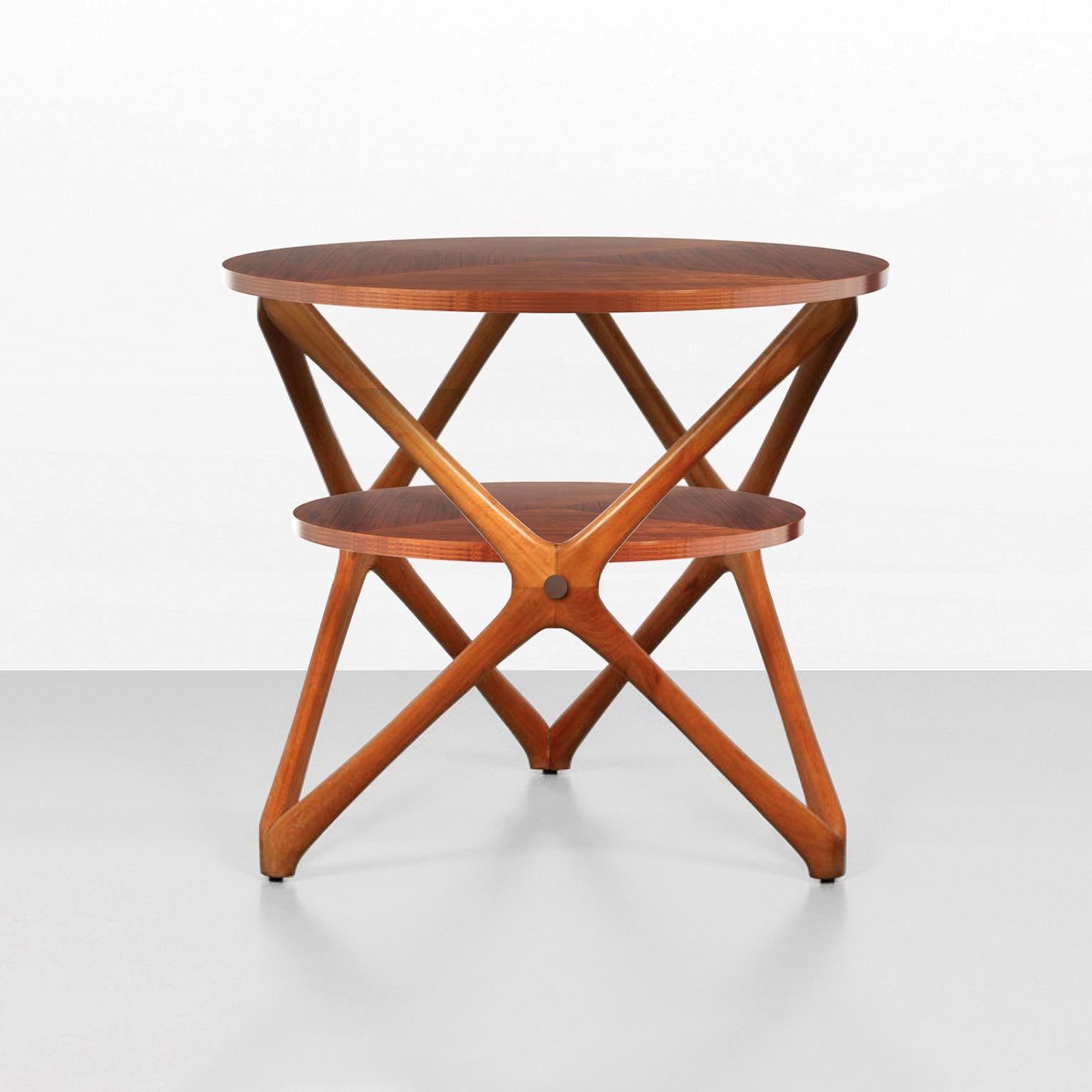 Round side table with geometric solid wood frame and two tops, customizable.
Production time: ca. 10 weeks.