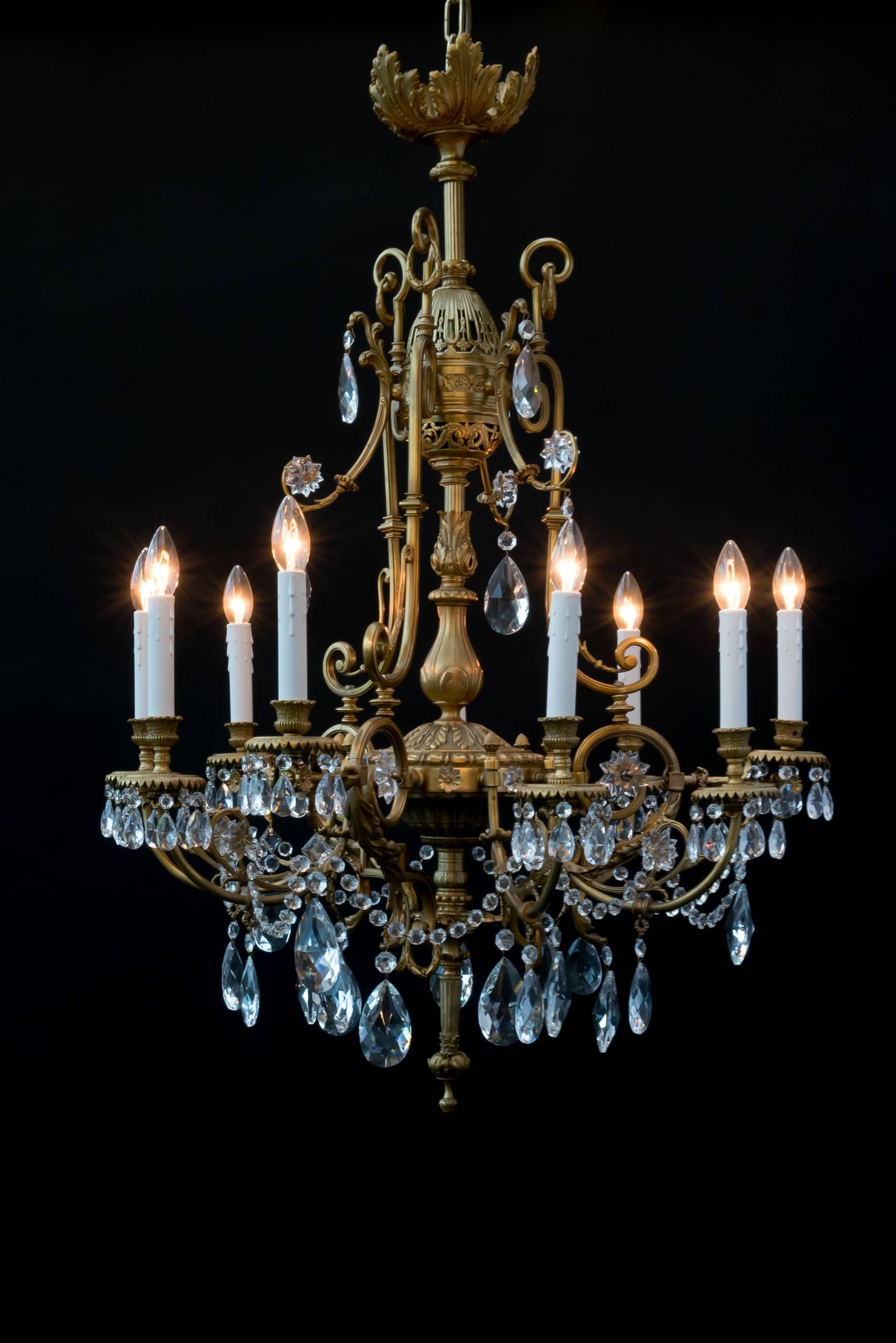 Gorgeous French chandelier in neoclassical style.
Made of bronze in Paris, circa 1860.
Intended for gaslight and later converted to electricity.
Bohemian crystal parts.
Unique elegant chandelier.

