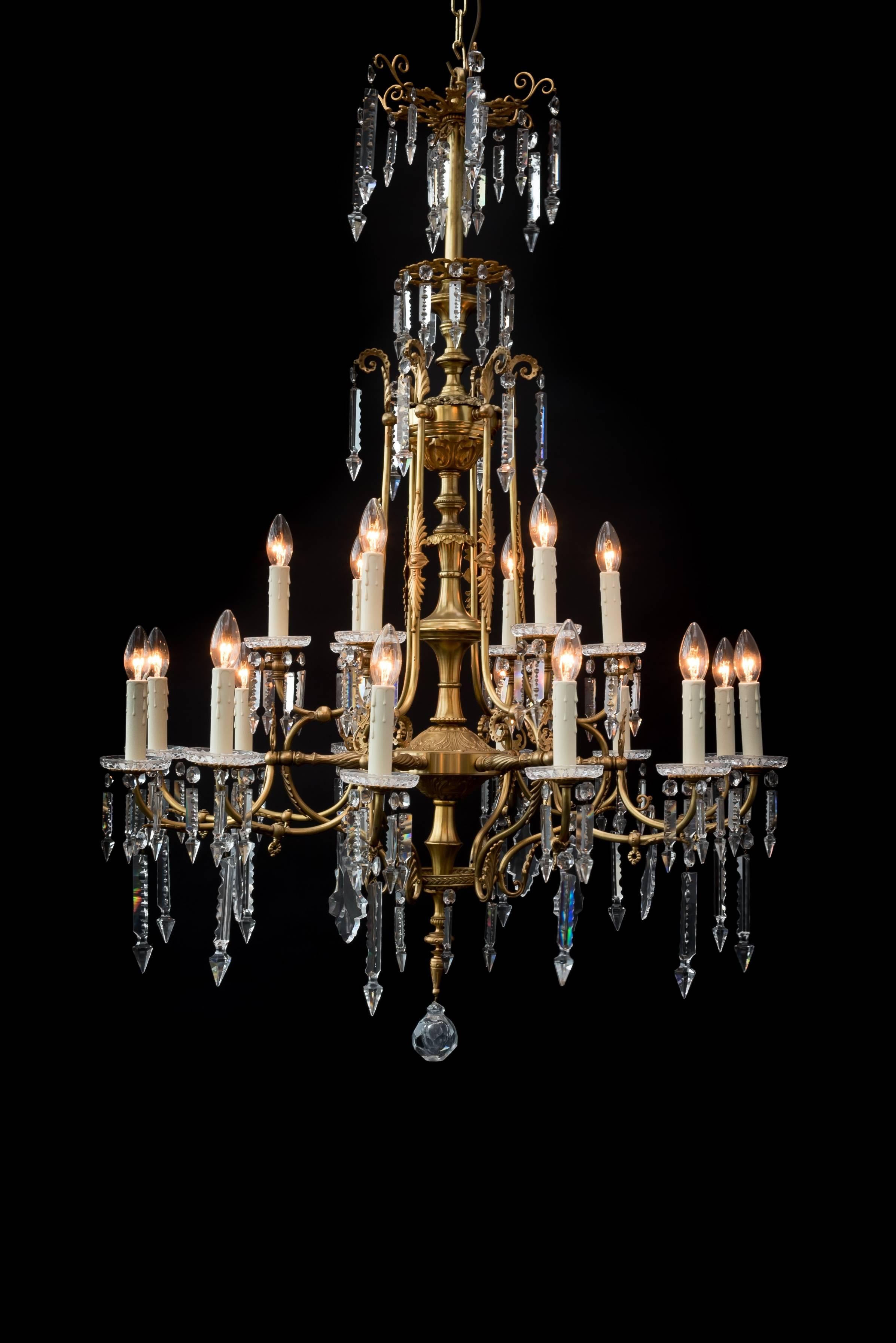 Eighteen-light French chandelier in neoclassical style.
Made from bronze and originally intended for gaslight later converted to electricity. 
Cast in Paris circa 1860 with beautiful original hand-cut crystals.
Unique chandelier.