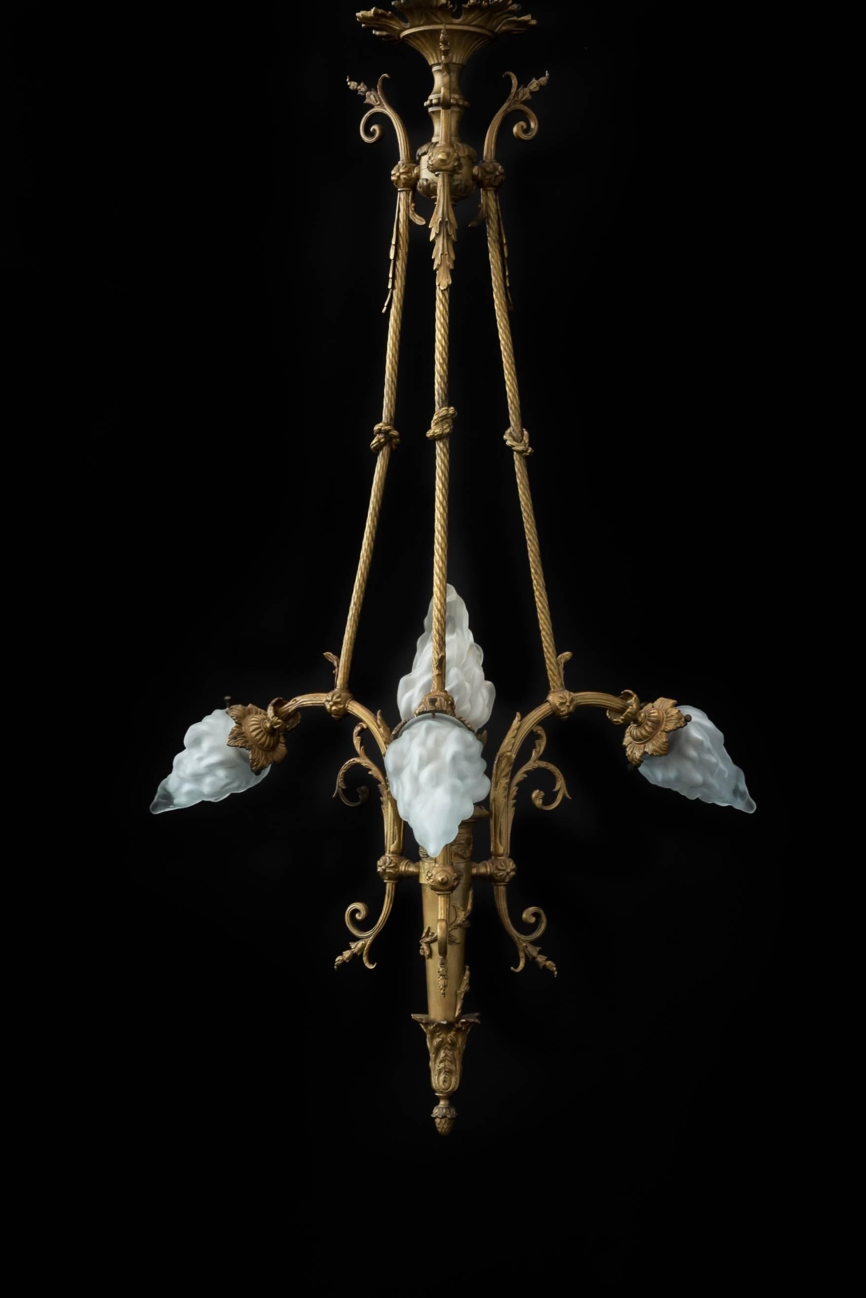 Slim hall lamp from bronze in Empire style.
Made in Paris, circa 1900.
Wonderful 2nd Empire style ornaments with hand-shaped glass balls in flame motif.
Elegant slender pendant.