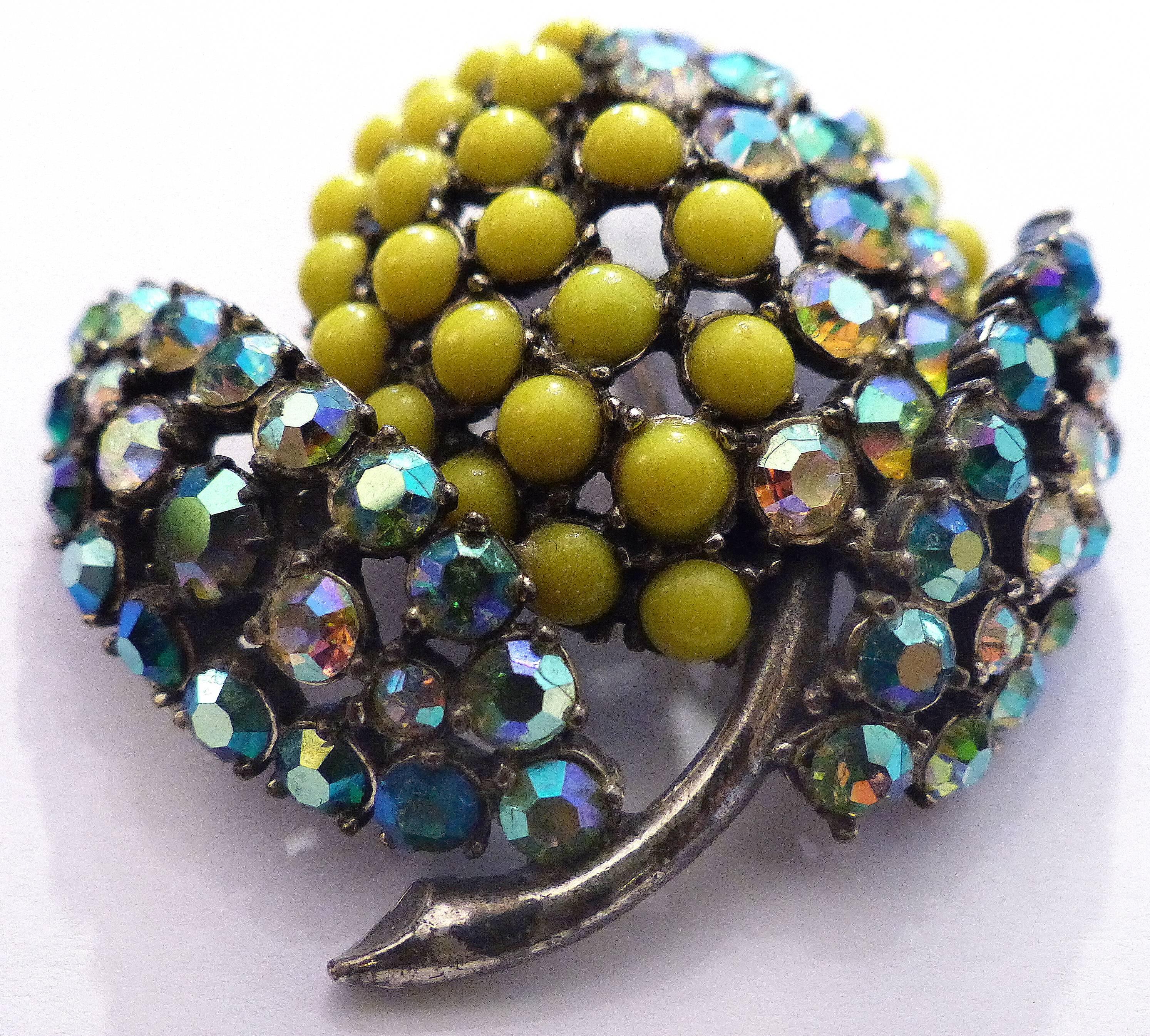 

A 1950s colorful rhinestones brooch created as a lemon is a fine example of Elsa Schiaparelli's work. Schiaparelli worked alongside Coco Chanel and was responsible for some of the greatest creations of the 20th century.
   