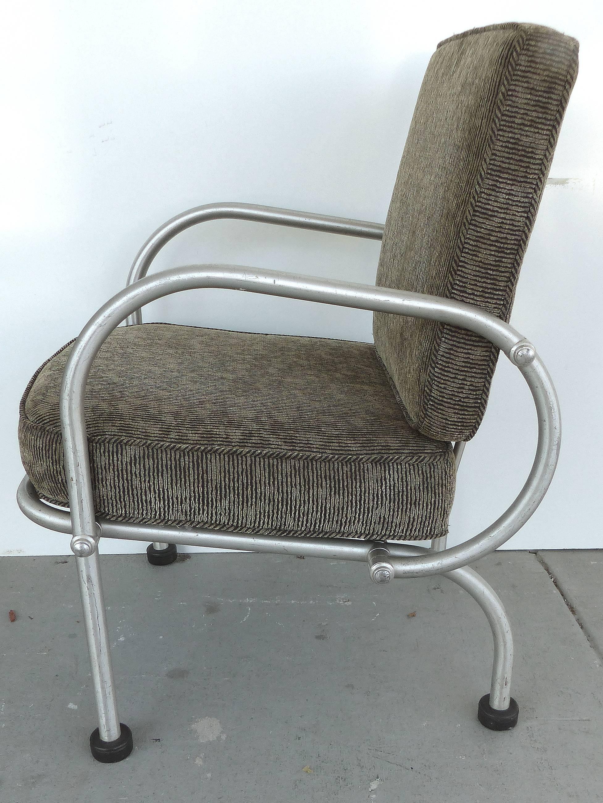 A comfortable American Art Deco armchair designed by Warren McArthur (1885-1961) for the Phoenix Arizona Biltmore Hotel in 1933. Constructed of aluminium tubing anodized by McArthur’s process, the chair has the original rubber feet and upholstered