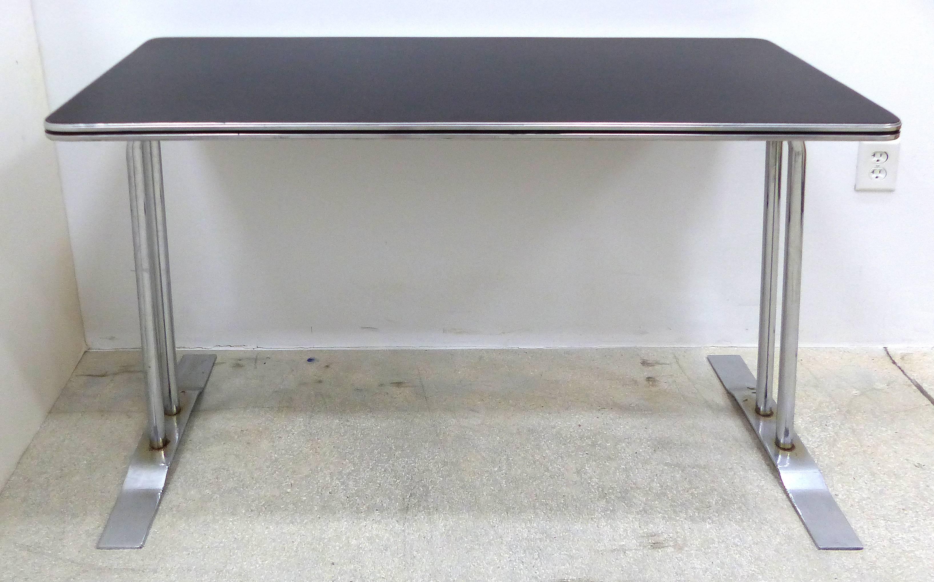 Art Deco Streamline Chrome Writing Table or Console Table

A streamline Art Deco writing desk in chrome that can be used as a console table. A very sleek example of iconic Art Deco design.

            