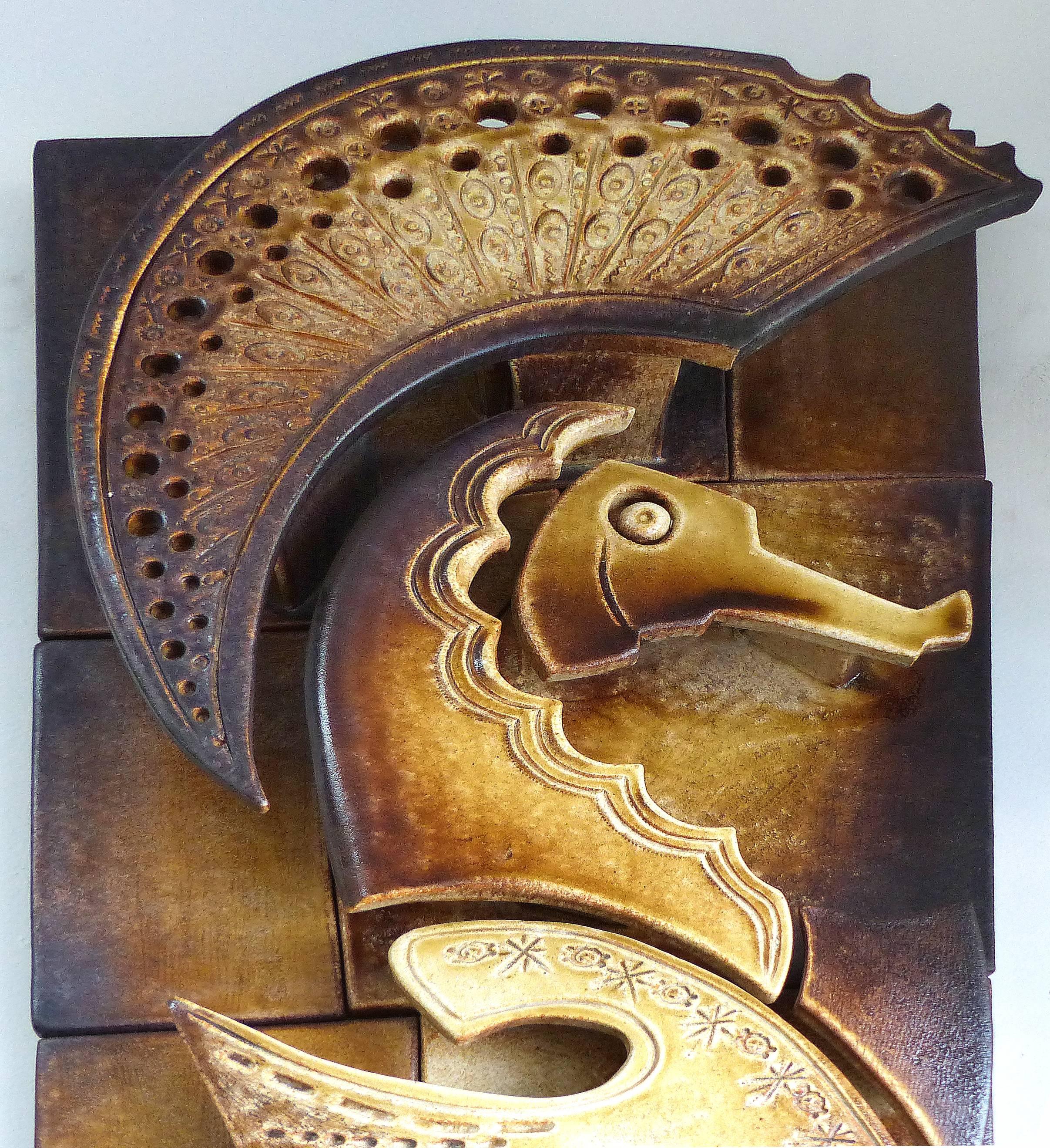 1977 Vintage Glazed Ceramic Clay Seahorse Wall Sculpture

A striking 1977 hand-built clay seahorse wall sculpture created with great depth. Illegibly signed lower left. The work comprises several panels mounted on board. 

  
 