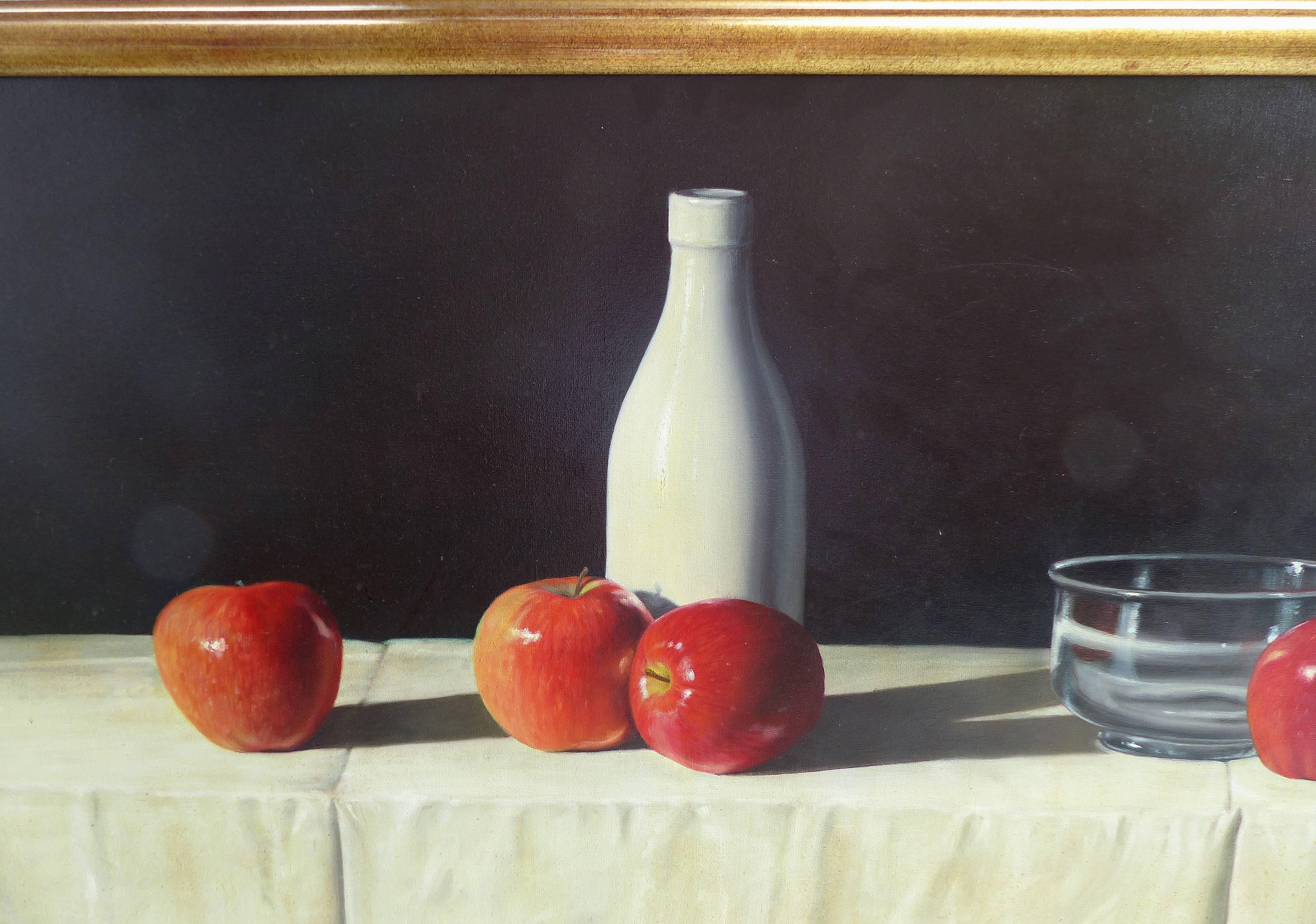 

Oil painting on canvas by Argentine artist, G.B. Valverde. Signed lower right and on verso and dated 2004. This still life depicts a table with a draped tablecloth and a bottle with apples and a clear glass bowl against a black background.