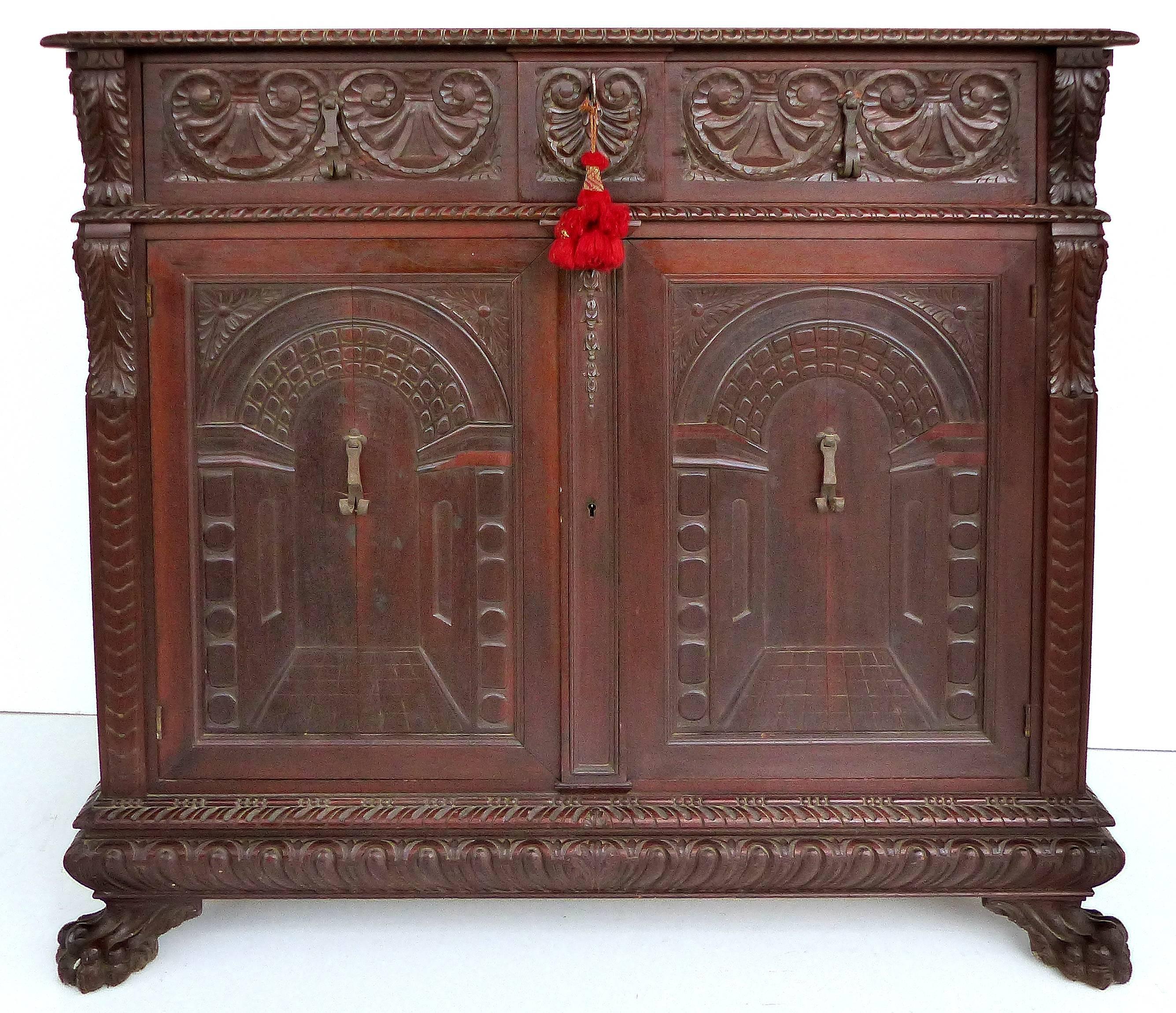 American Renaissance Revival Carved Cabinet by S. Pagano, New York Dated 1930

Offered is an American renaissance revival cabinet signed S. Pagano, New York, 1930 on the back upper edge. From a prominent Coconut Grove estate of the heirs of the Eli