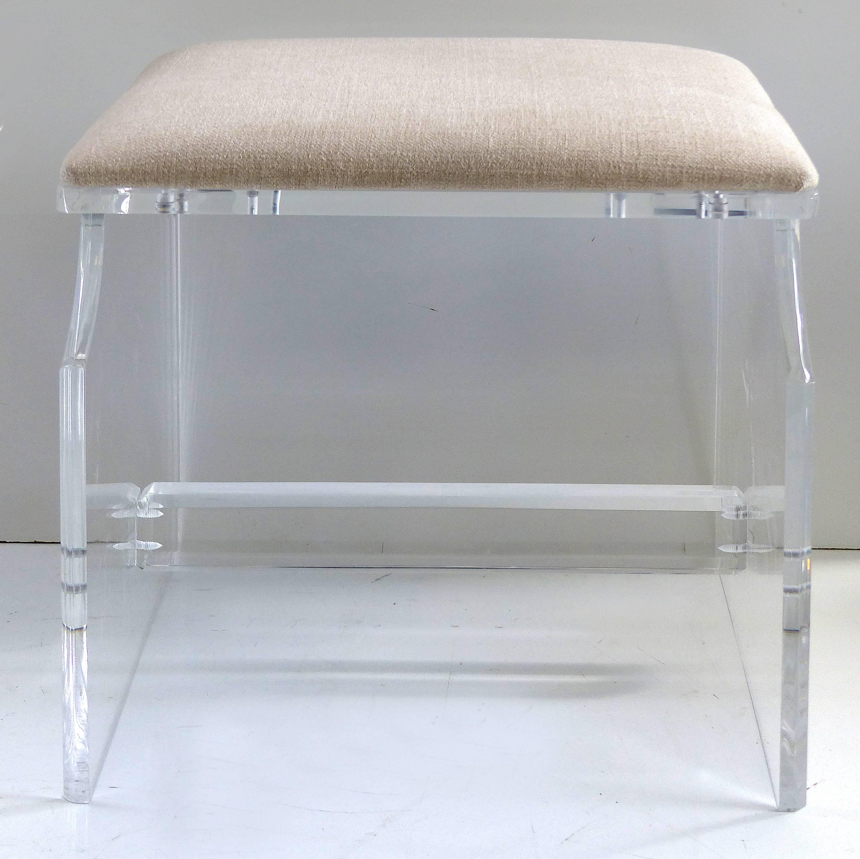 Custom-Made Lucite Piano Bench or Stool

Offered is a custom-made Lucite piano bench with upholstered seat and reinforced with a lower cross stretcher. The bench can be used as a vanity bench or stool.