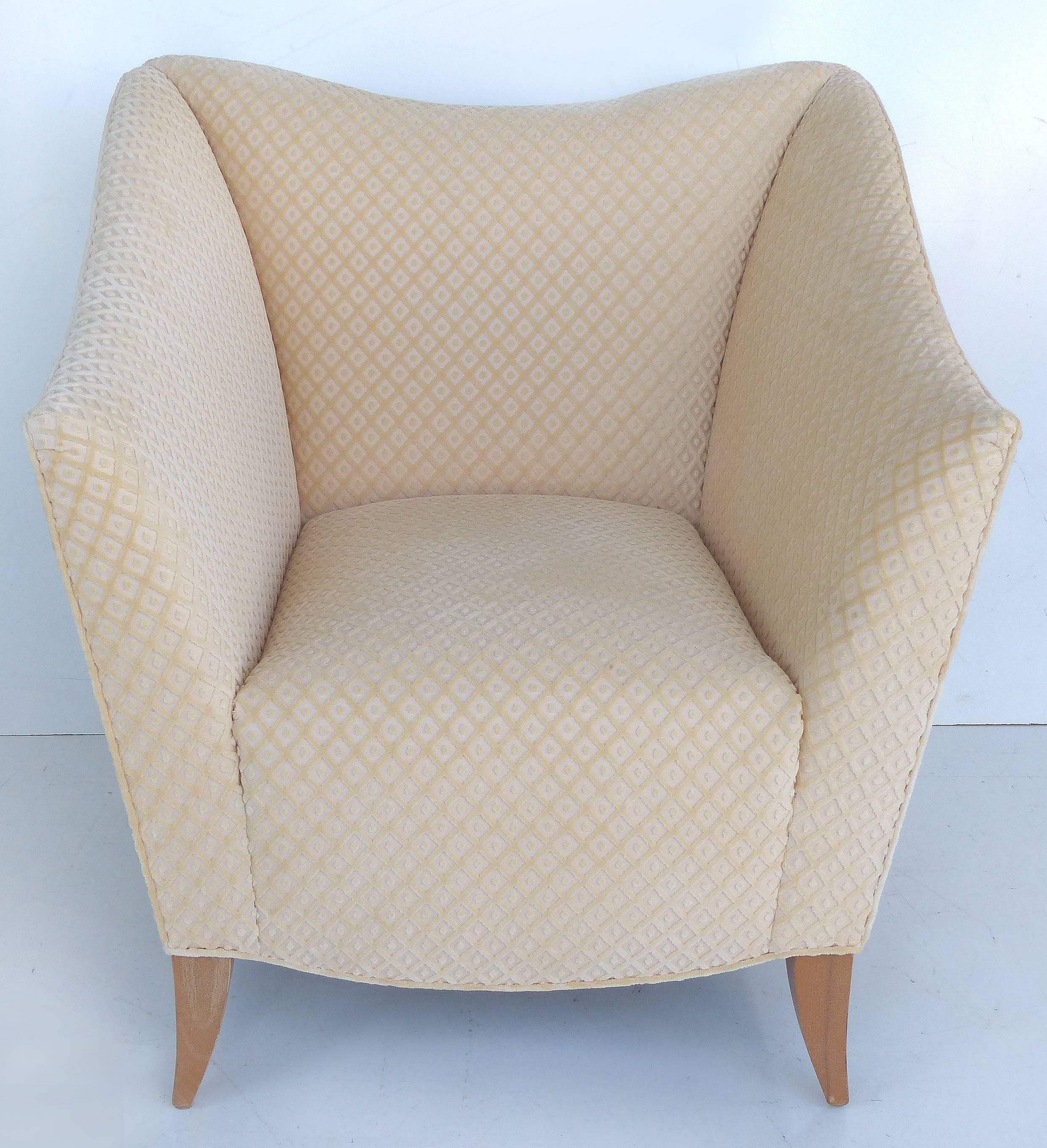 Sculptural Upholstered Club Chairs by Swaim, Pair

Offered for sale is a pair of plush, upholstered, sculptural club chairs by Swaim. The upholstery is a cut velvet in an ivory color with peach undertones. The splayed legs are tapering and in a