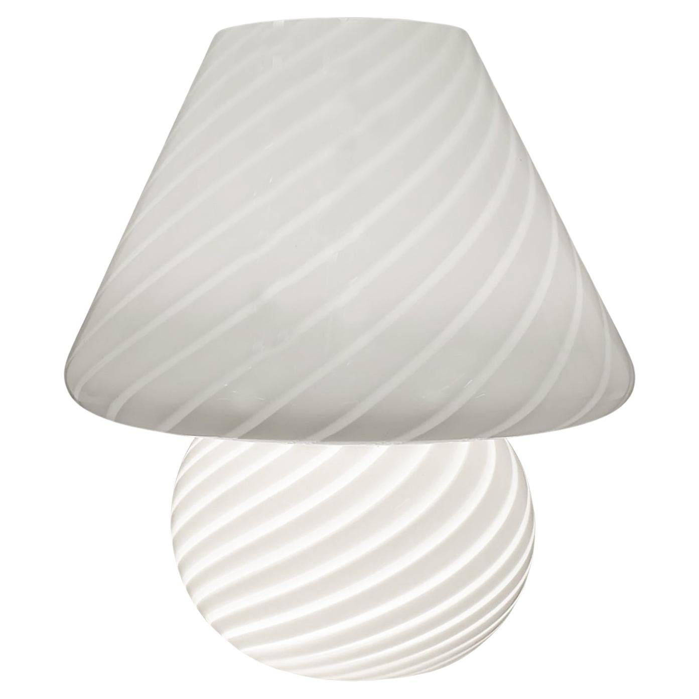 Mid-century Vitri Swirled Blown Murano Glass Table Lamp 

Offered for sale is a Mid-century Vitri Murano Glass table lamp that is hand blown in the Vitri swirl pattern.  

14