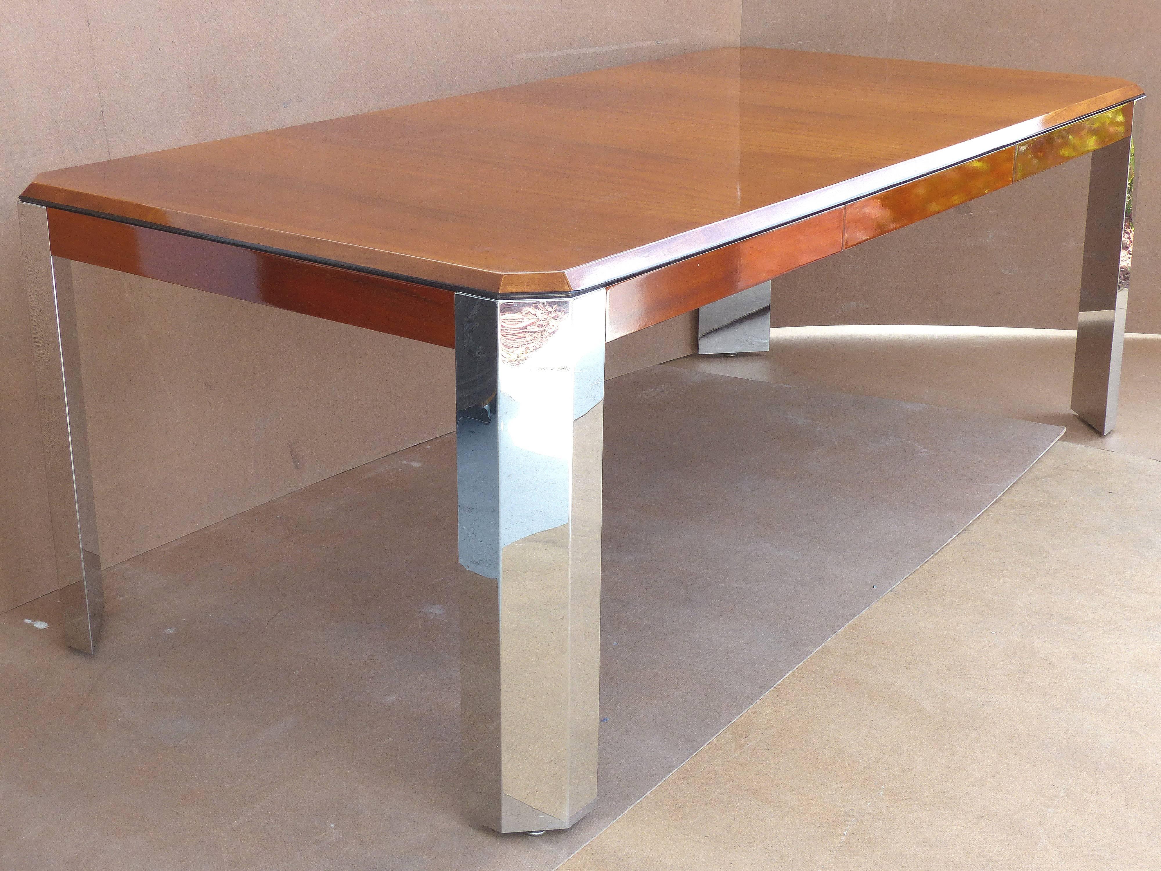 Mid-Century Leon Rosen Pace Collection Desk

An elegant, Mid-Century Modern desk or dining table constructed of blond mahogany, with stainless steel legs featuring a unique, trapezoidal shape. Designed by Leon Rosen for the Pace collection. This