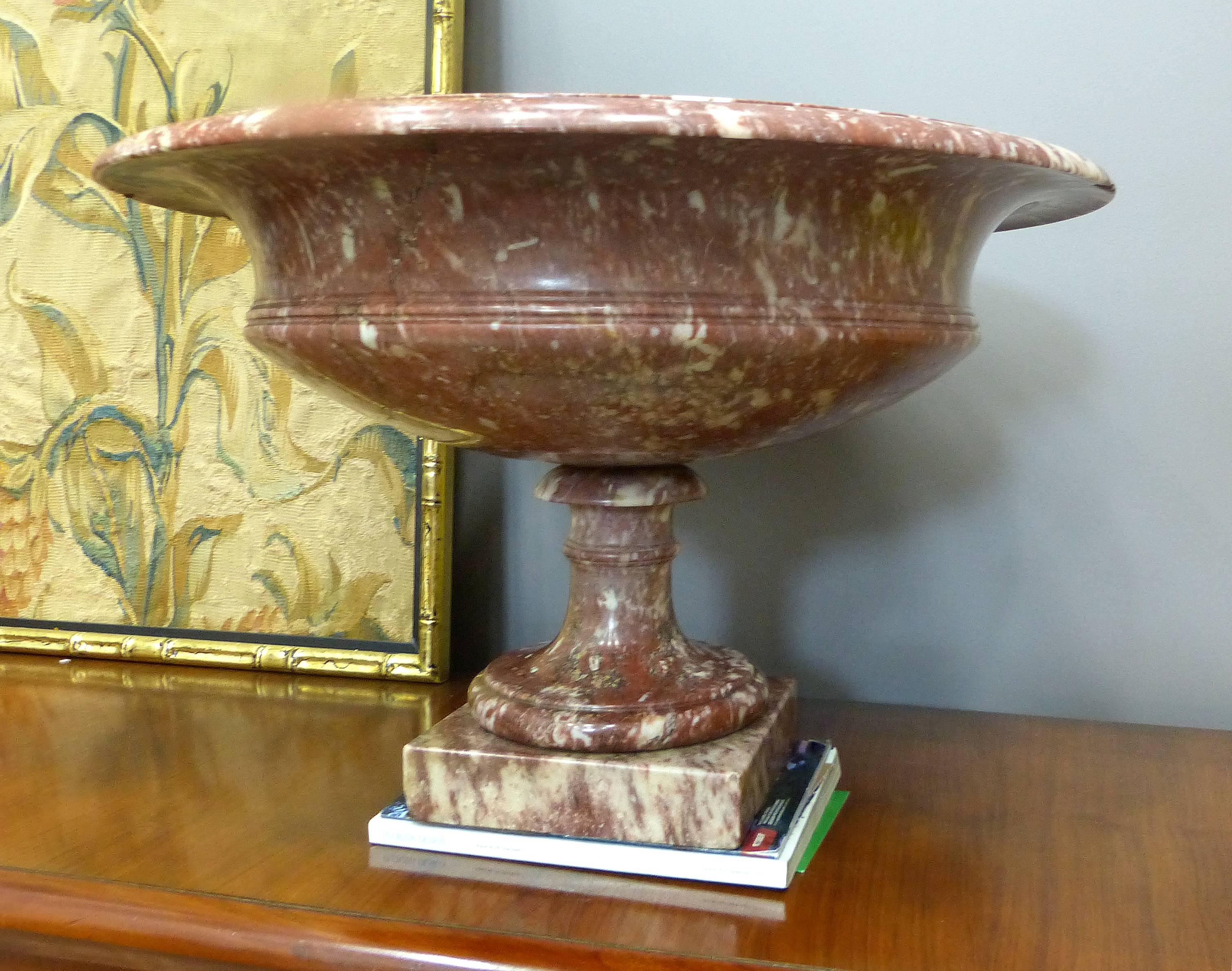 Pair of 19th Century Turned Rossa Verona Marble Tazzas

This is an impressive and substantial pair of classically designed Italian Rossa Verona marble urns on marble plinths. Base has measurements of 8.5