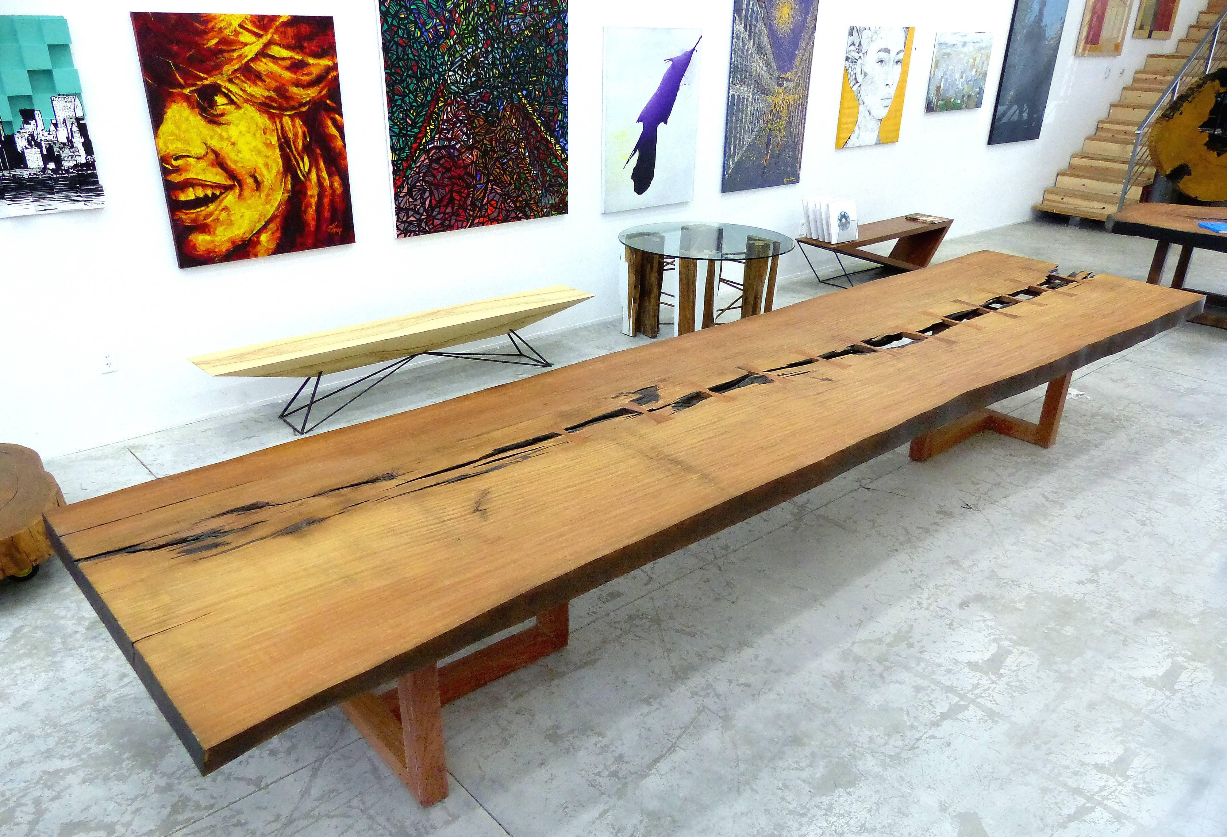 Monumental Brazilian Amazon Garapa Wood Table by Artist Valeria Totti

Offered is a large and monumental garapa wood table designed by Brazilian artist Valeria Totti in conjunction with the Brazilian government in a joined effort of reforestation of