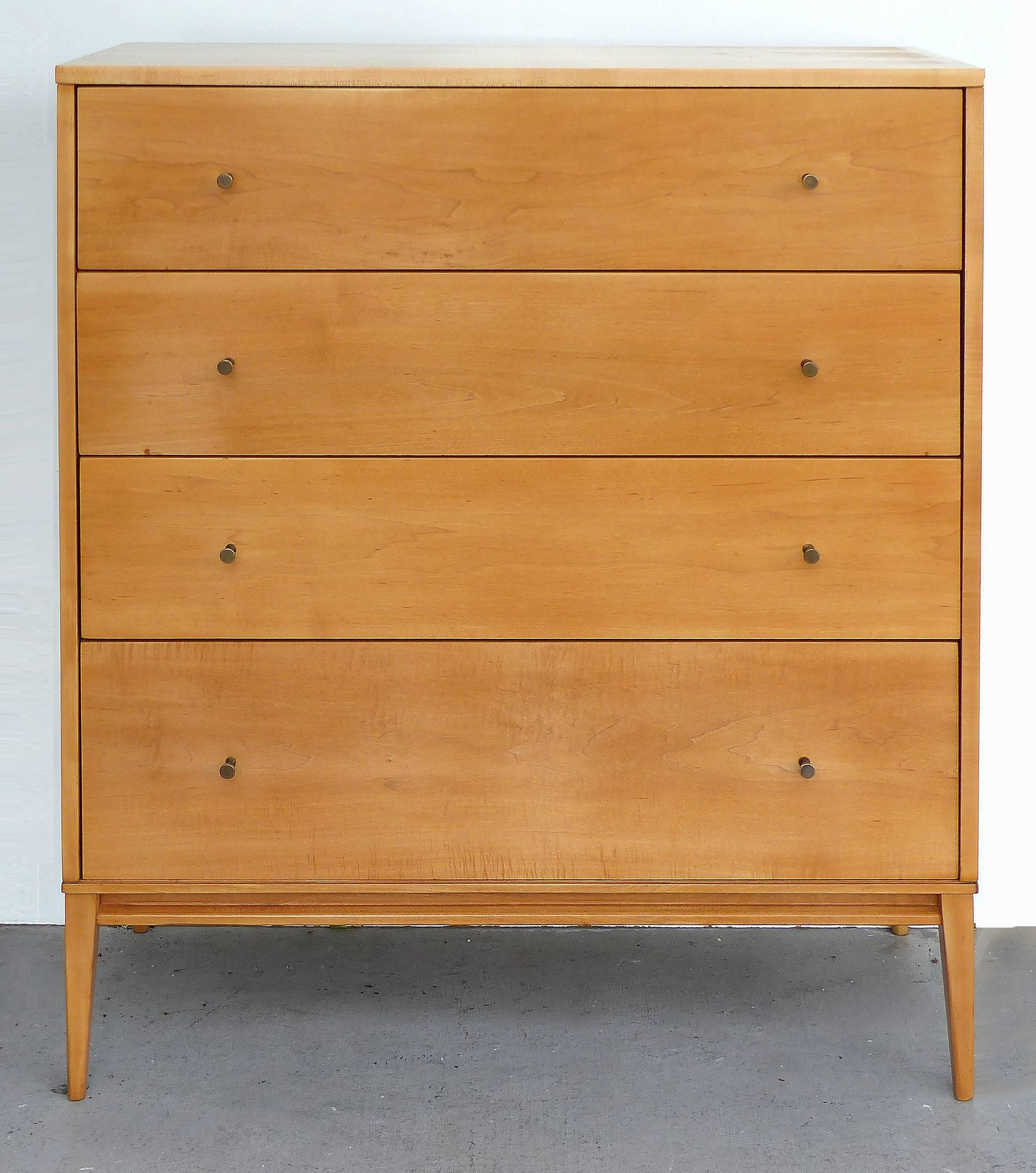 Offered is a tall chest of drawers by Paul McCobb (June 5, 1917 – March 10, 1969) for the Planner Group in maple with brass pulls.
The Planner Group, manufactured by Winchendon Furniture Company, was among the best selling contemporary furniture