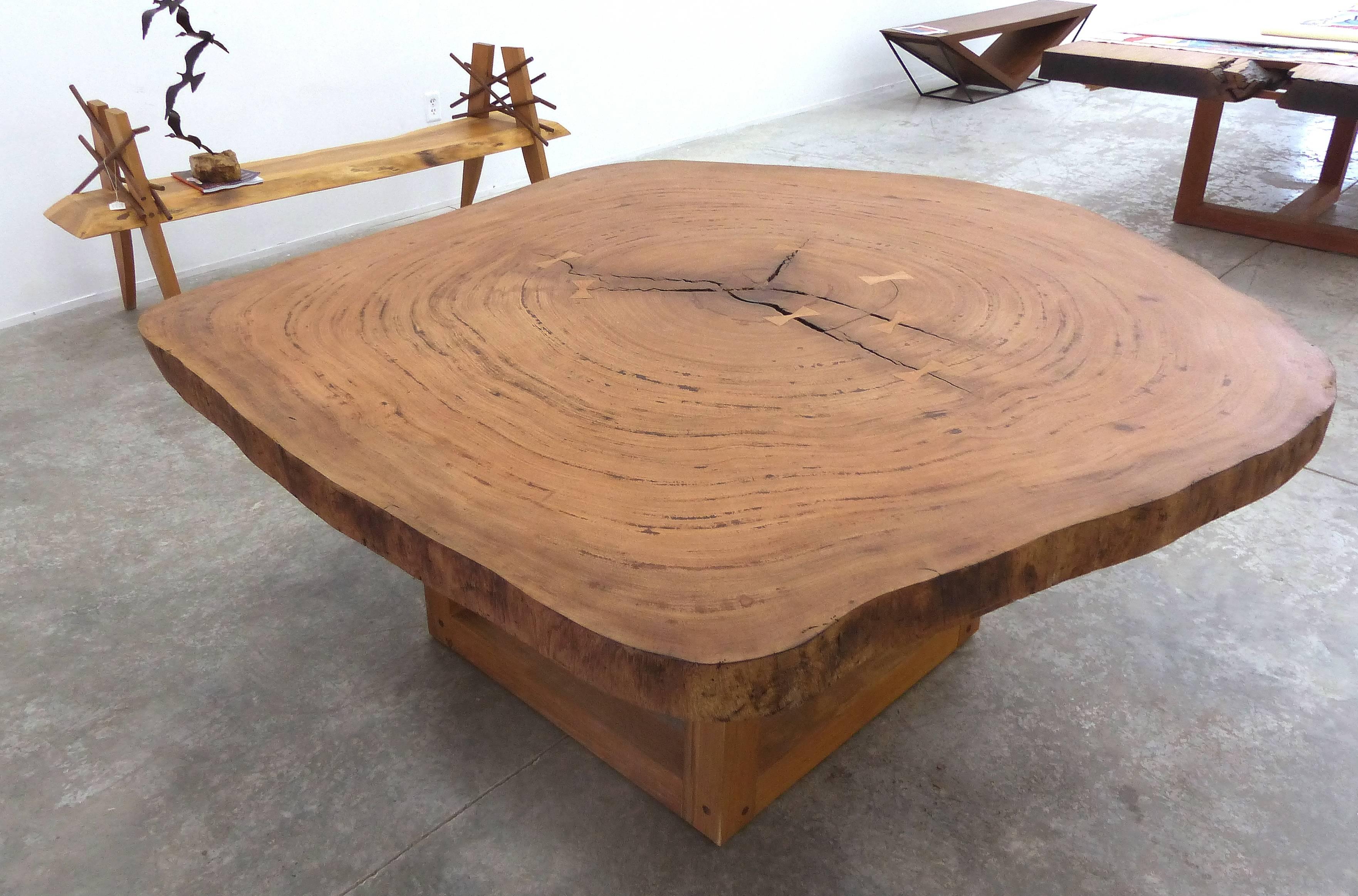 Organic Dining Table by Valeria Totti, Reclaimed Wood from the Brazilian Amazon

Offered for sale is a large, organic dining table designed by the Brazilian artist Valeria Totti using reclaimed wood from the Brazilian Amazon. The type of wood is
