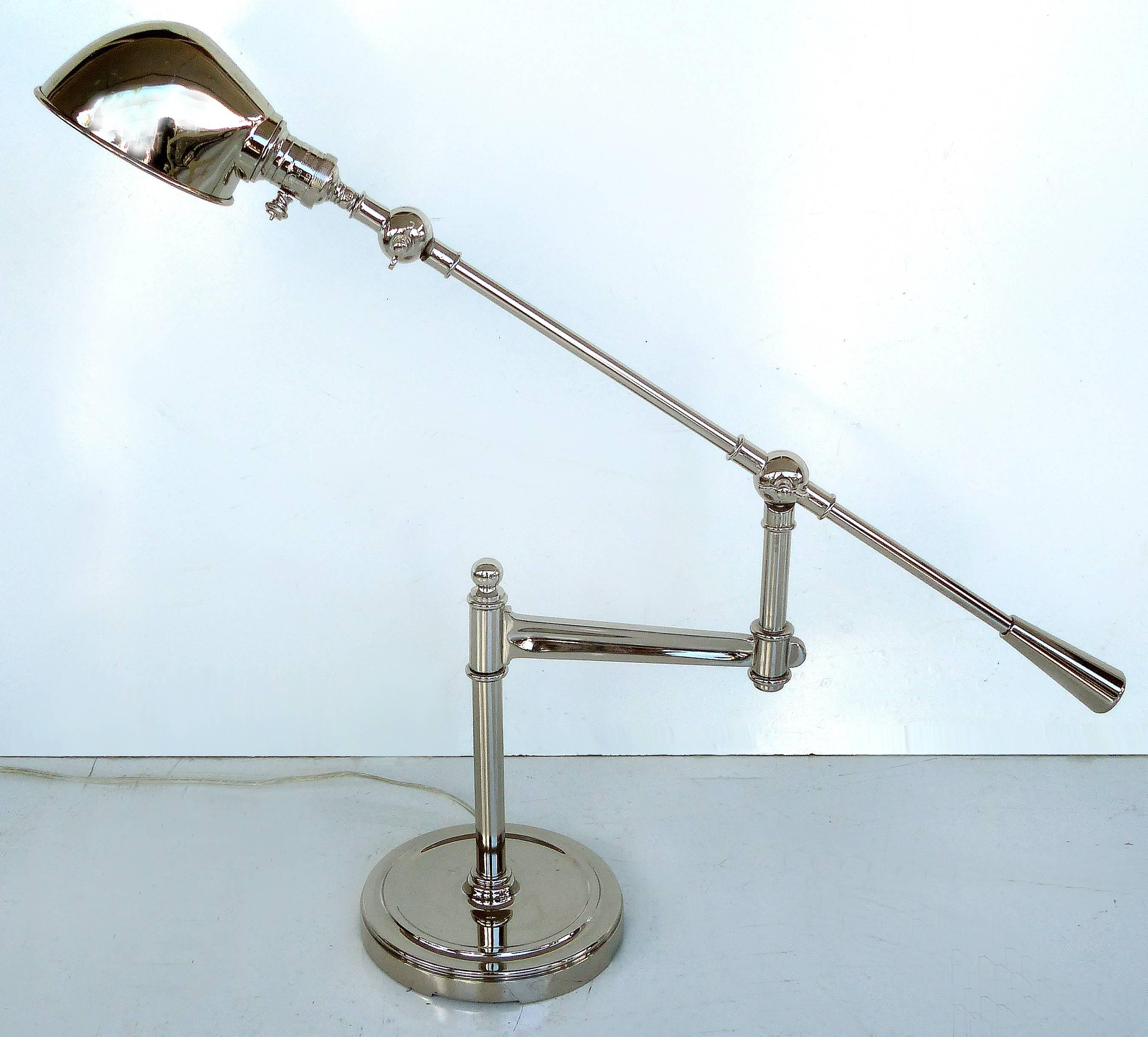 Fine quality adjustable chrome task lamp with pivoting arm.

Offered for sale is an adjustable chrome desk lamp with a pivoting arm and adjustable shade. This is a substantial, heavy and fine quality lamp. Wired and in working condition and uses a
