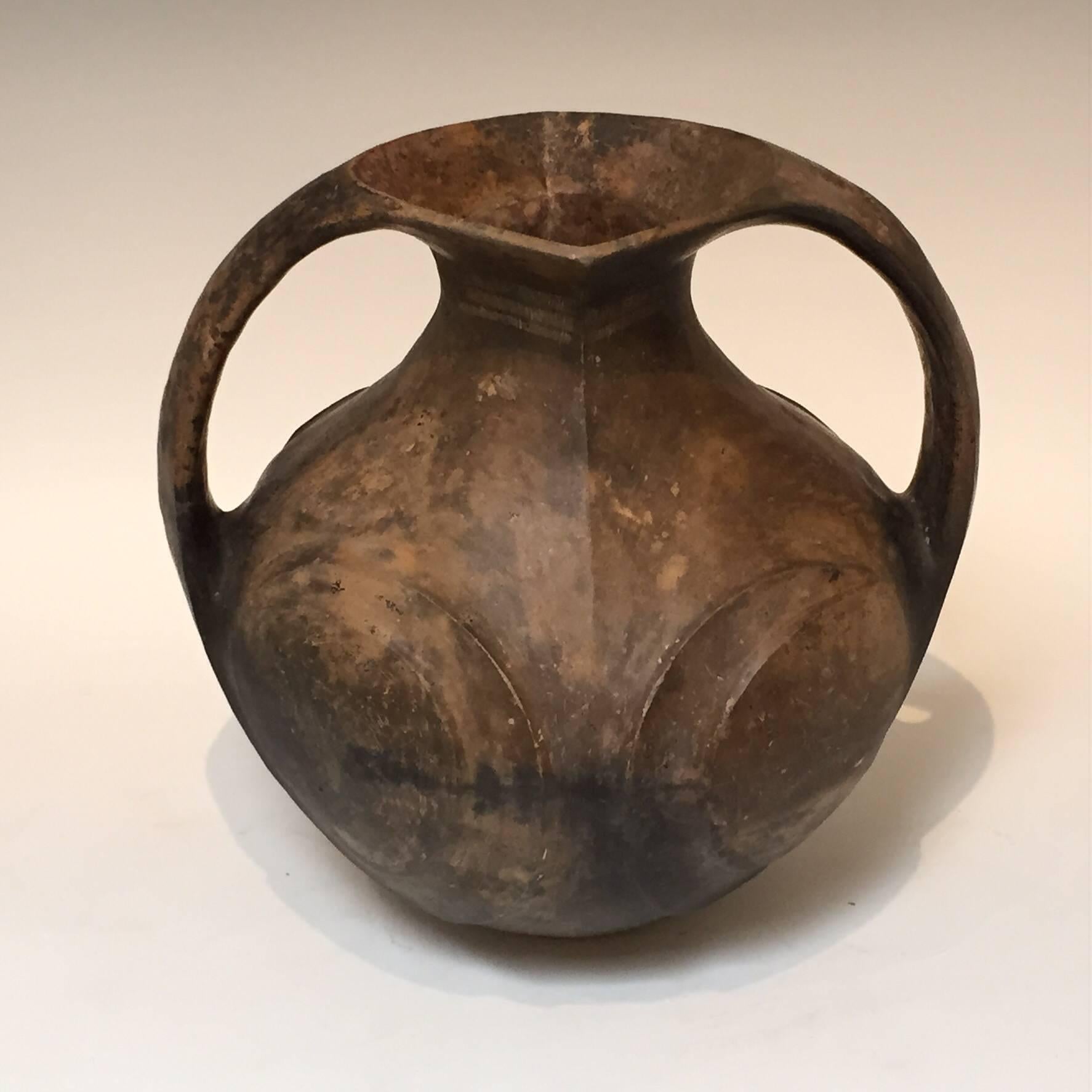 This elegant Han Dynasty amphora with two handles standing 13