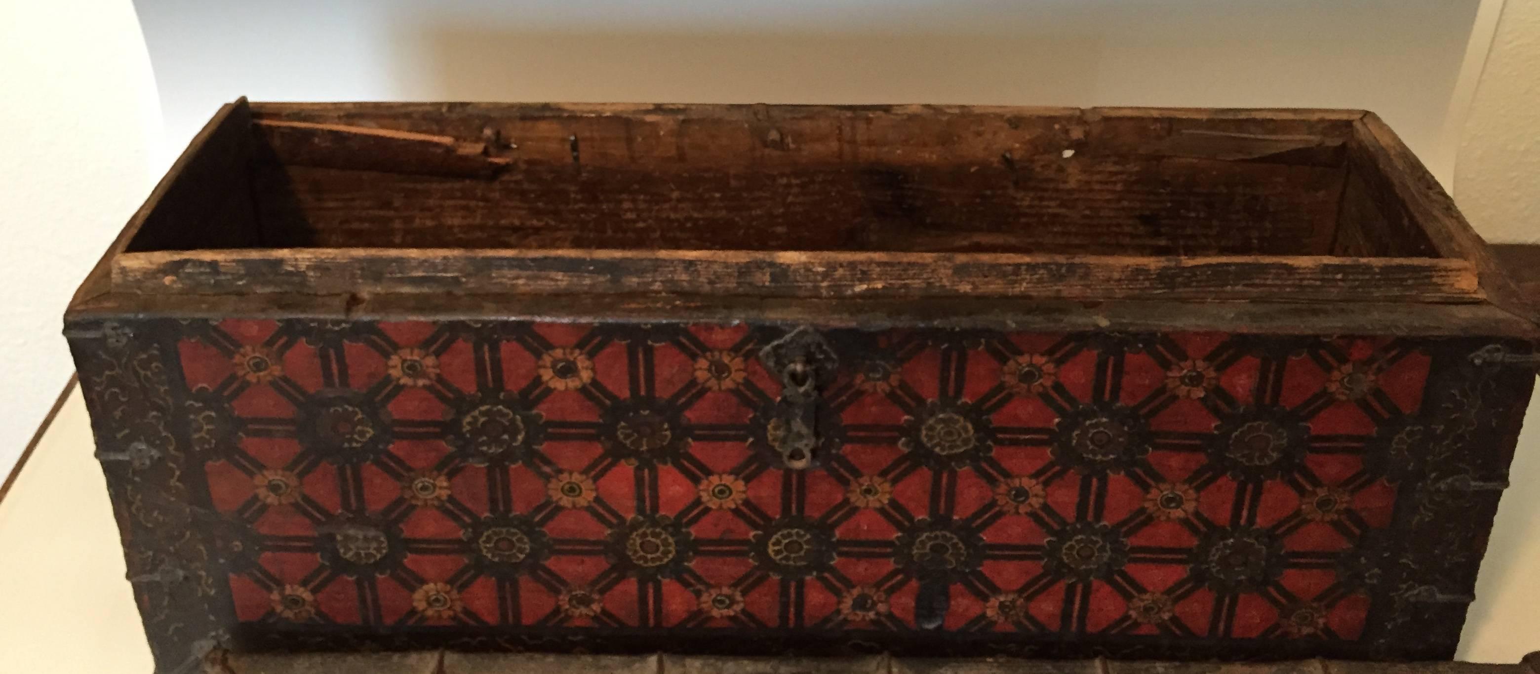
Here is an ancient Tibetan wedding trunk from the 19th century or earlier. All original lacquer, paint and hardware. The front is painted with a flower motif. The lid lifts off (hinges are off). Each side has original metal handles.
Measures: 13