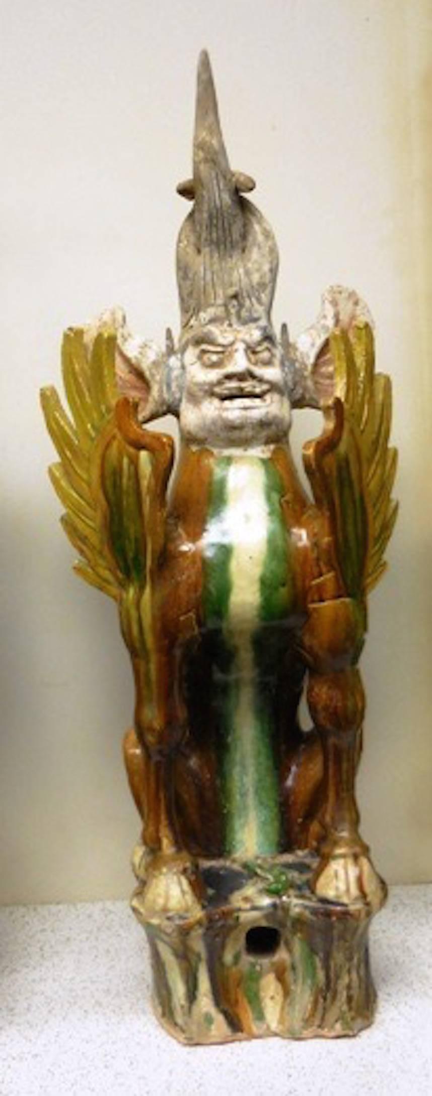 Offered by J R Richards
A pair of Tang dynasty Sancai glazed earth spirits.
Earth spirits normally are shown as a pair: One modeled in the form of a spirit animal (lion), and the other with human characteristics.
Shown here, the animal spirit with