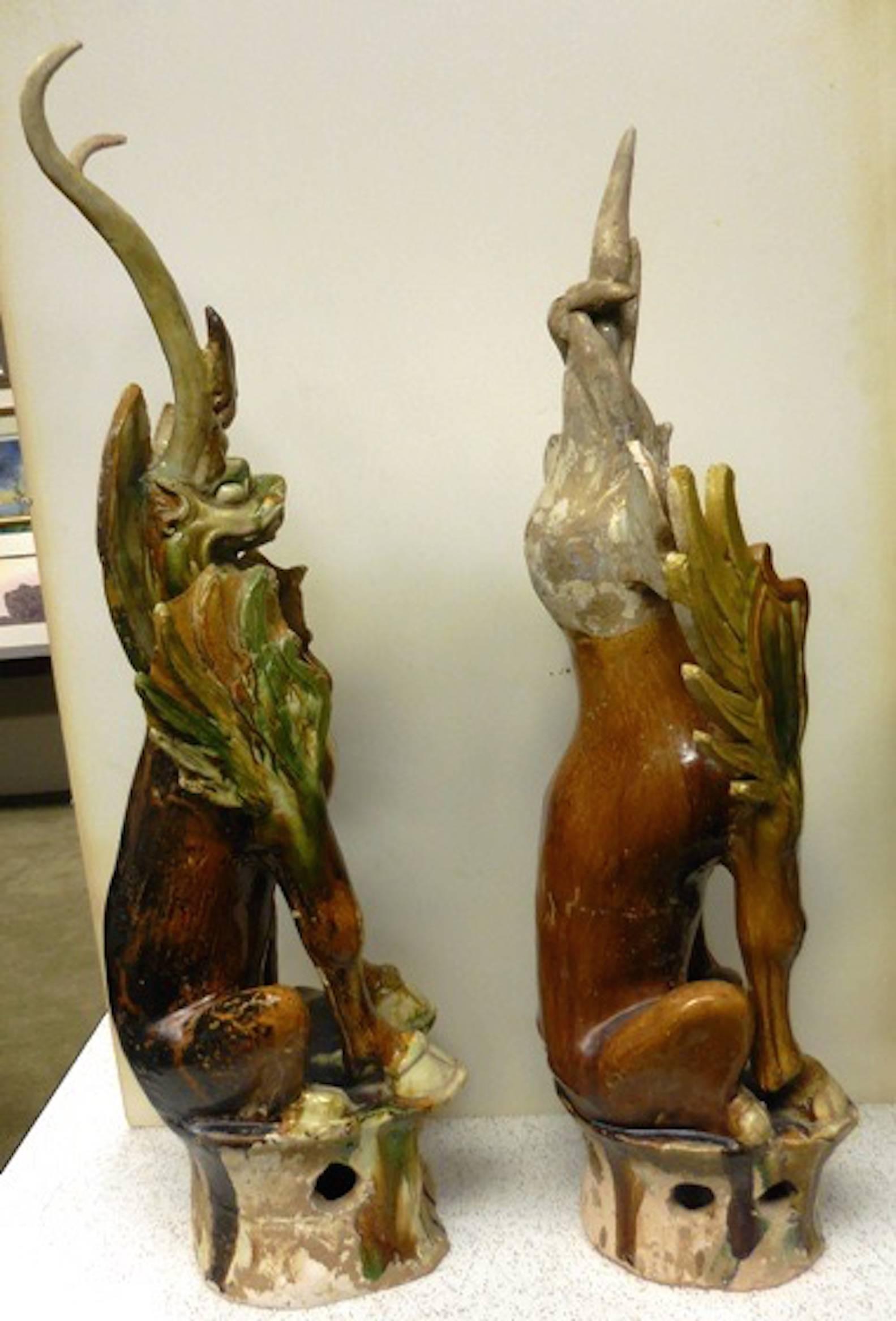 18th Century and Earlier Pair of Ancient Chinese Tang Dynasty Sancai Glazed Earth Spirits For Sale