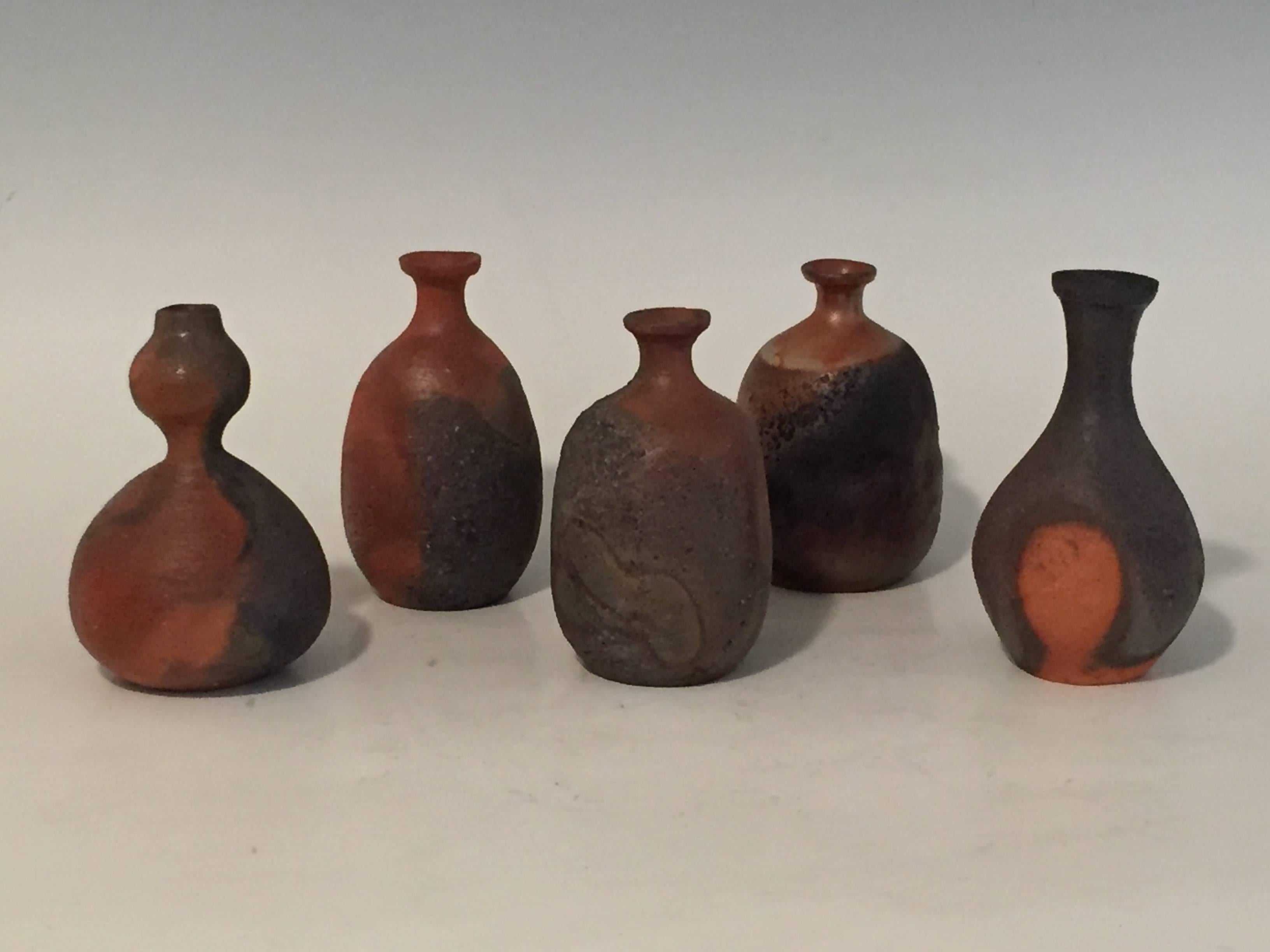 Offered by J R Richards
Set of five ceramic sake bottles by three well known Contemporary Japanese Artists:
Wakimoto Hiroyuki. Born 1952-
Osawa Tsuneo. Born 1962-
Hoshino Sei. Born 1959
Each approximately 5.5