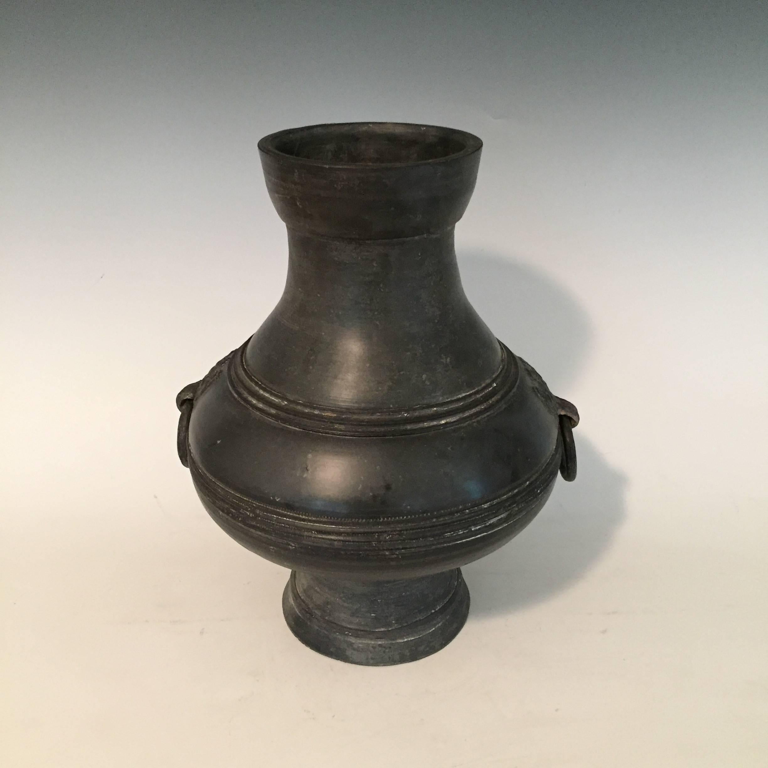 Offered by J R Richards
An ancient Chinese pottery jar dating to the late Warring States period - Western Han dynasty. ((221–206 BC).
Of elegant form characteristic of earlier bronze shapes.
A rare jar featuring black pottery with two Taotie Masks