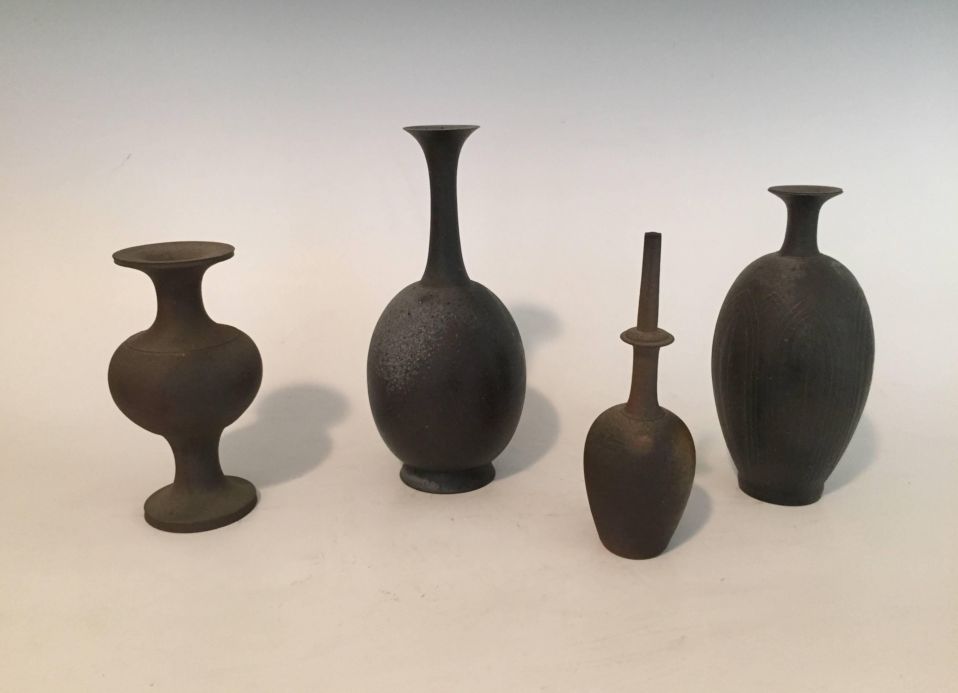 Offered by J R Richards
A group of four distinctive stoneware vases by Japanese Ceramist Koji Toda (born 1974-).
Beautiful hand thrown and each unique. It was Toda’s encounter with pre -12th century bronze water pitchers that inspired him to create