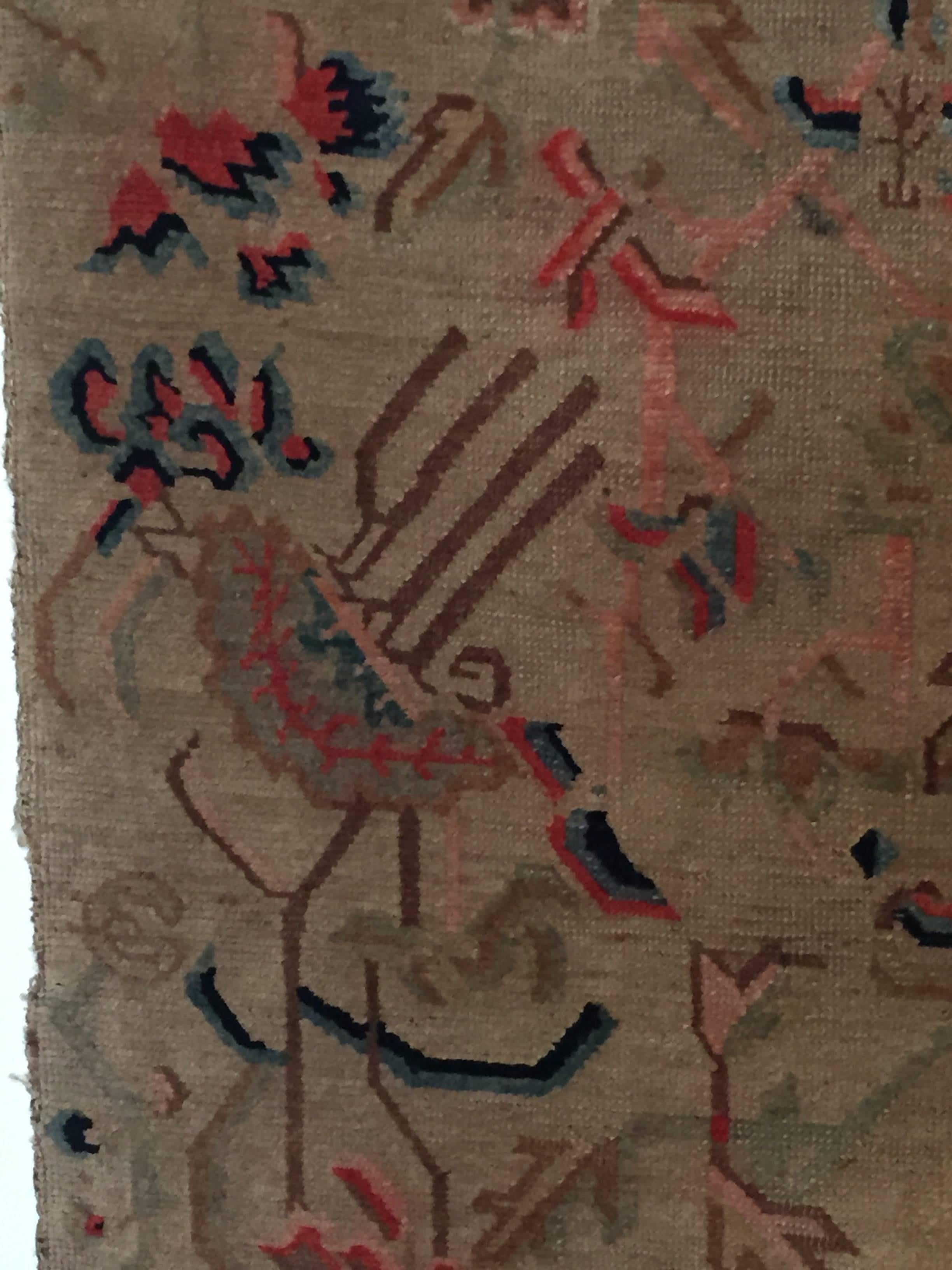 Here is a Khaden, a sitting or sleeping rug. Dating to circa 1930, Tibet.
Multicolored flowers on a beige field. Natural and synthetic dyes. Hand spun wool warp and weft.
Measures: 32 x 64