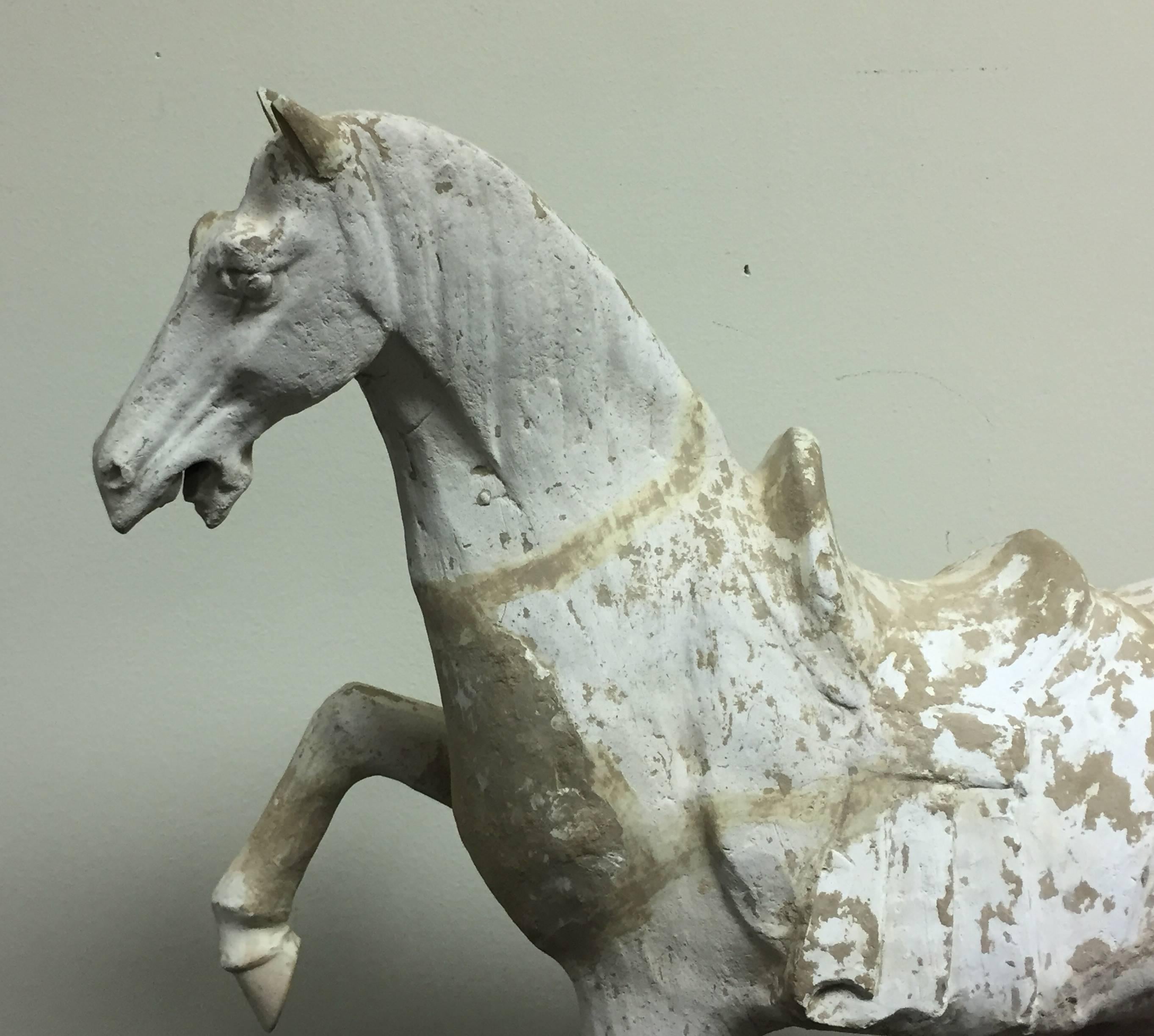 Offered by J R Richards
Tang dynasty white pottery prancing horse. (618-907A.D.)
TL Tested from Oxford Authentication.
Measures: 23