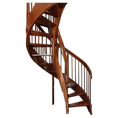 Escalera de caracol de caoba de doble carril